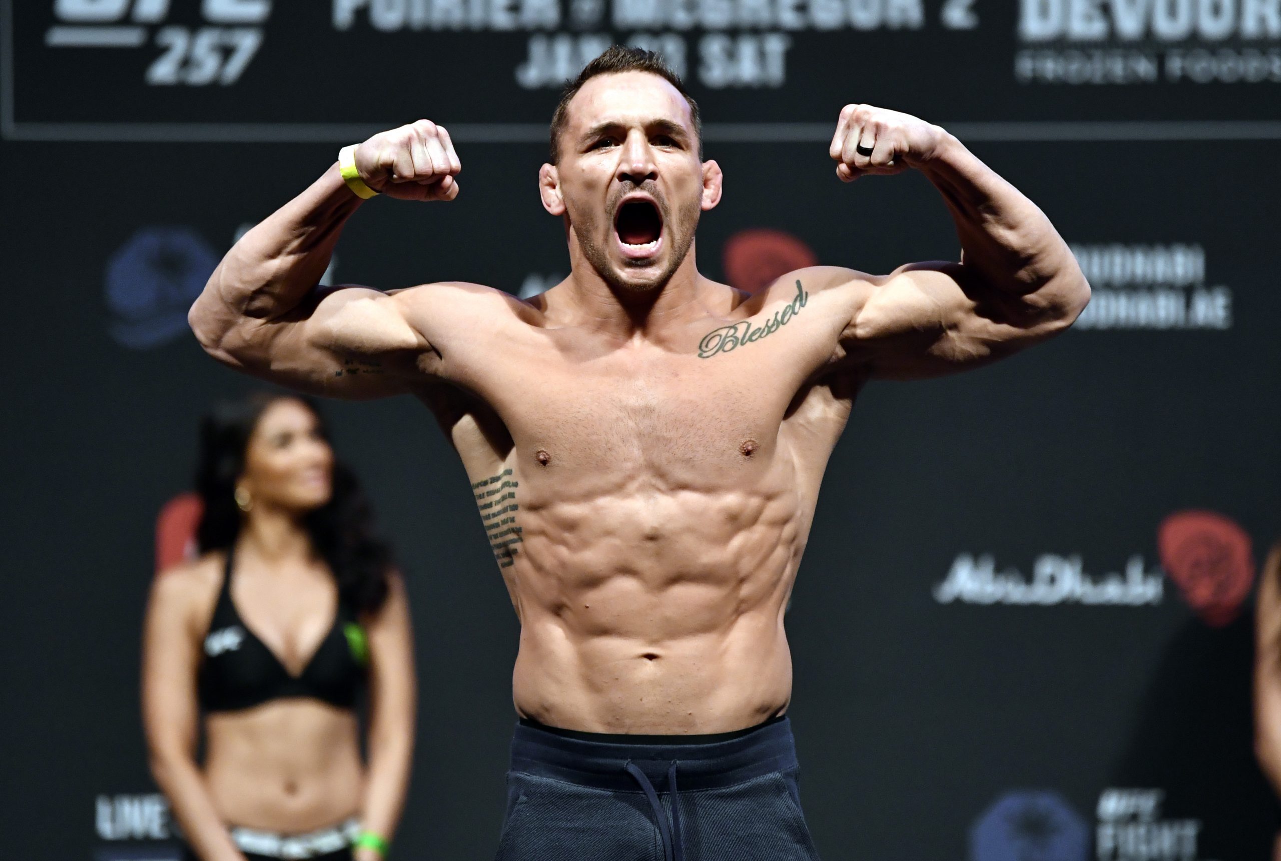Jan 22, 2021; Abu Dhabi, UNITED ARAB EMIRATES; Michael Chandler poses on the scale during the UFC 257 weigh-in at Etihad Arena on UFC Fight Island on January 22, 2021 in Abu Dhabi, United Arab Emirates.