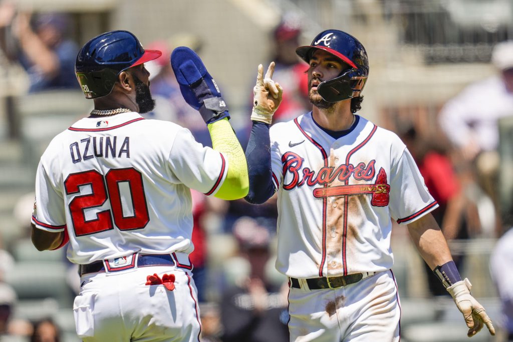 Dansby Swanson and Marcell Ozuna of the Atlanta Braves