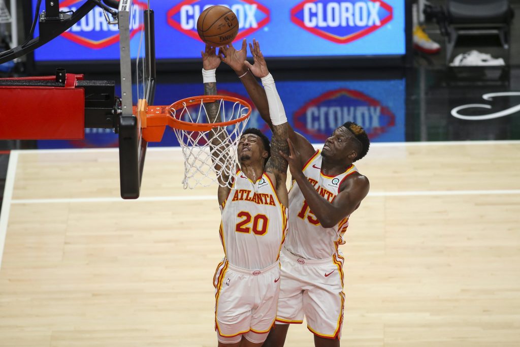 Clint Capela and John Collins of the Atlanta Hawks