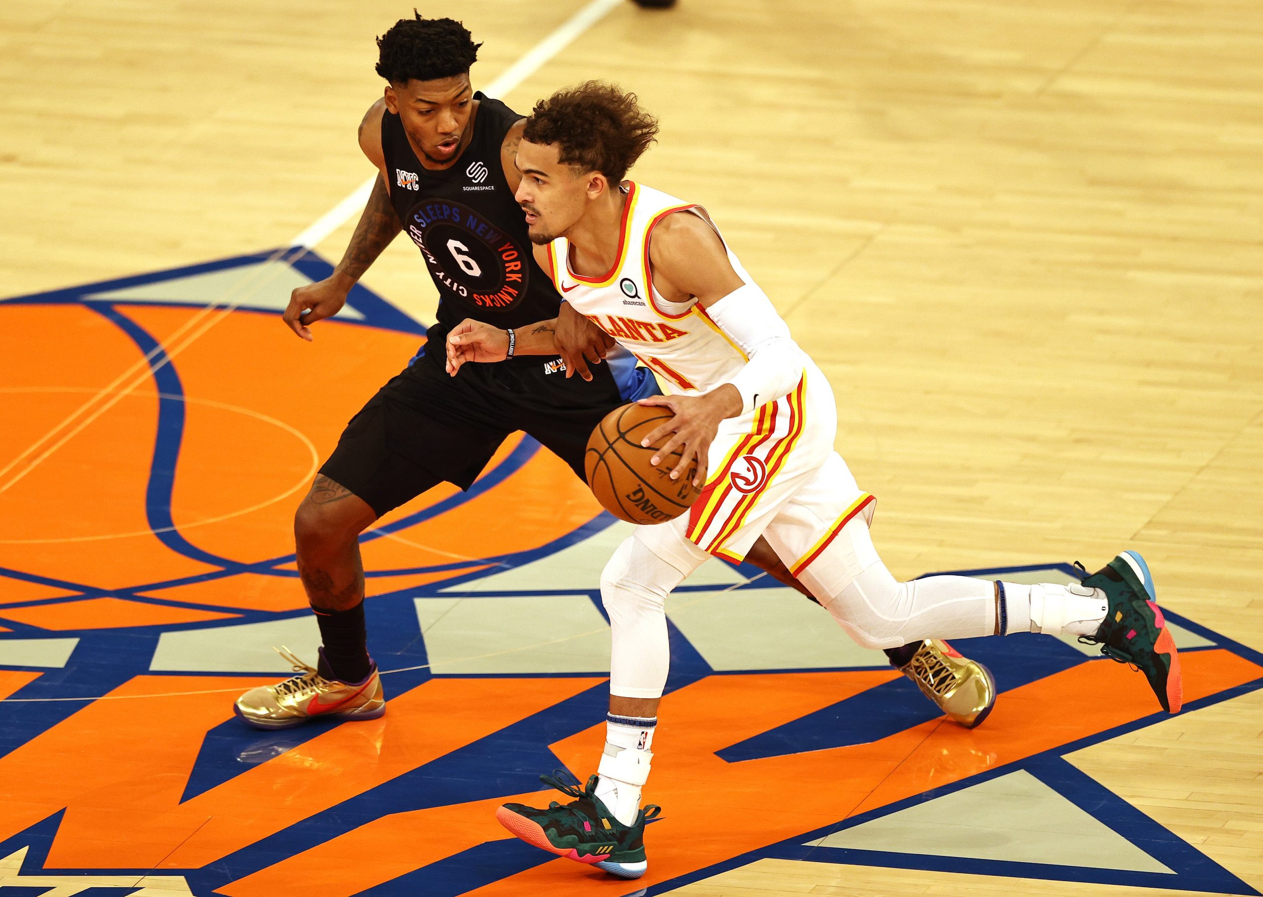 Atlanta Hawks guard Trae Young (11) moves the ball against New York Knicks guard Elfrid Payton (6) during the first half of game two of the Eastern Conference quarterfinal at Madison Square Garden