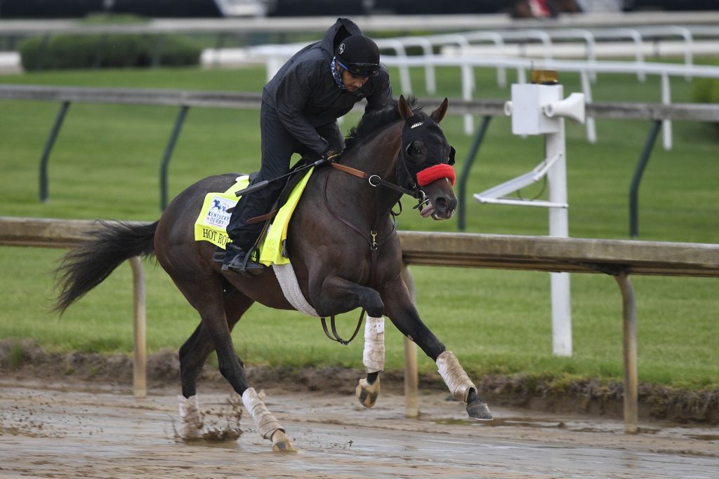 An exercise rider works out Kentucky Derby entry Hot Rod Charlie at Churchill Downs.
