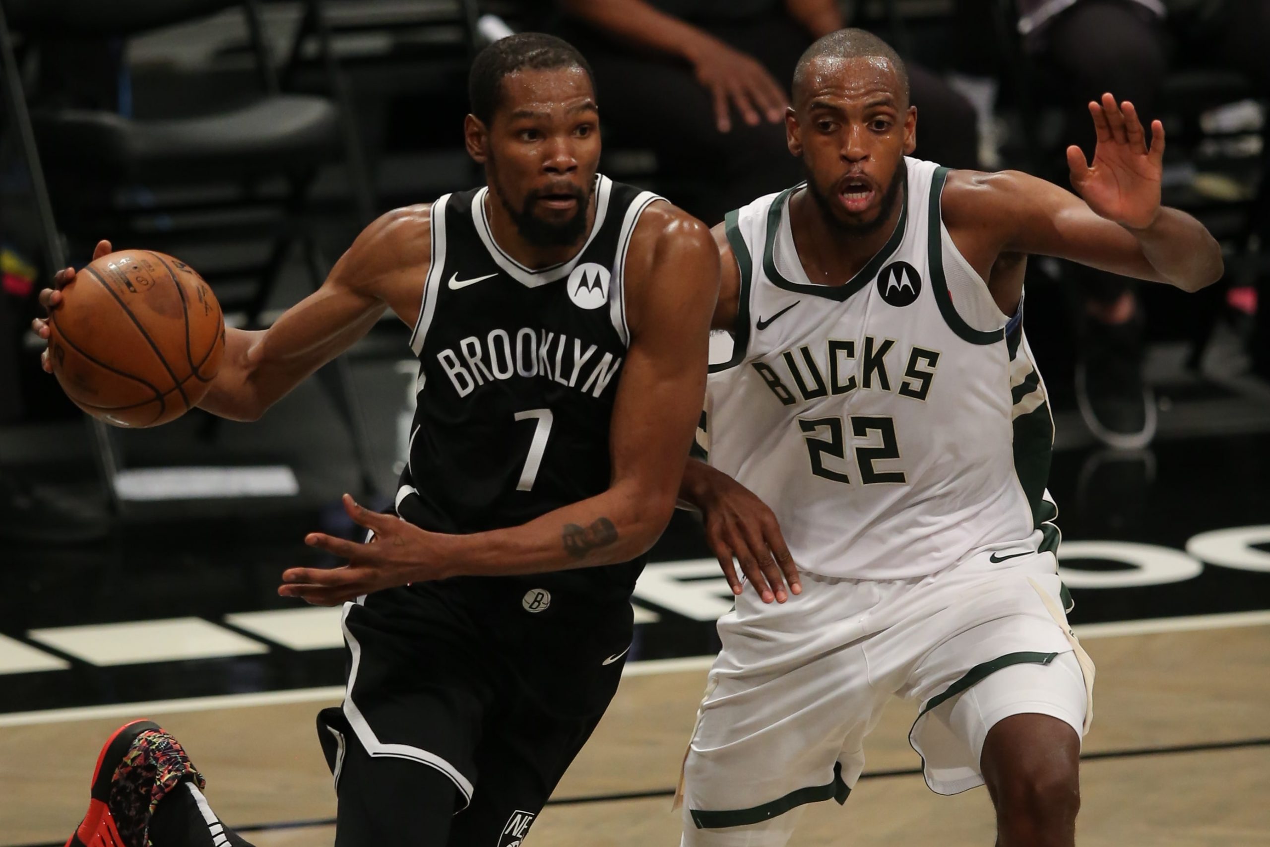 Brooklyn Nets power forward Kevin Durant (7) drives to the basket against Milwaukee Bucks small forward Khris Middleton (22) during the third quarter of game one in the Eastern Conference semifinals of the NBA Playoffs.