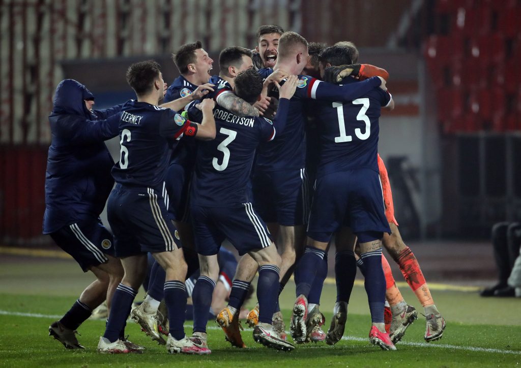 Scotland's players celebrate victory after the UEFA EURO2020 qualifying football match between Serbia and Scotland at the Rajko Mitic stadium in Belgrade, Serbia.