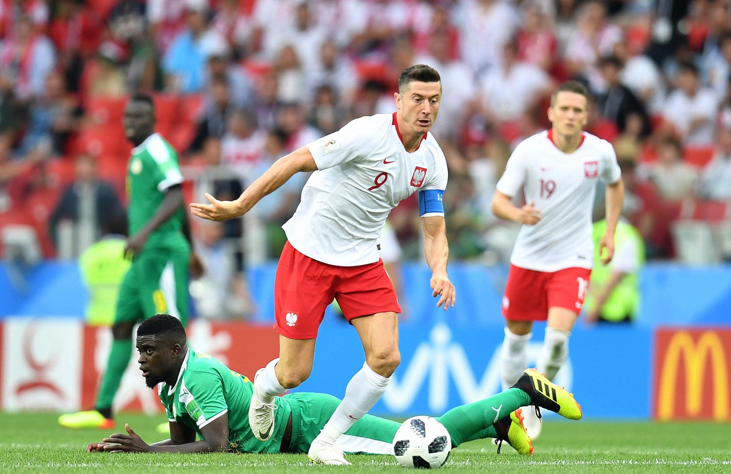 Poland forward Robert Lewandowski chases the ball against Senegal in Group H play during the FIFA World Cup 2018 at Spartak Stadium.