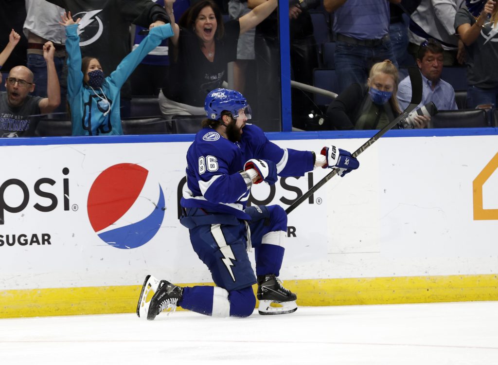 Jun 5, 2021; Tampa, Florida, USA; Tampa Bay Lightning right wing Nikita Kucherov (86) celebrates as he scores a goal against the Carolina Hurricanes during the third period in game four of the second round of the 2021 Stanley Cup Playoffs at Amalie Arena.