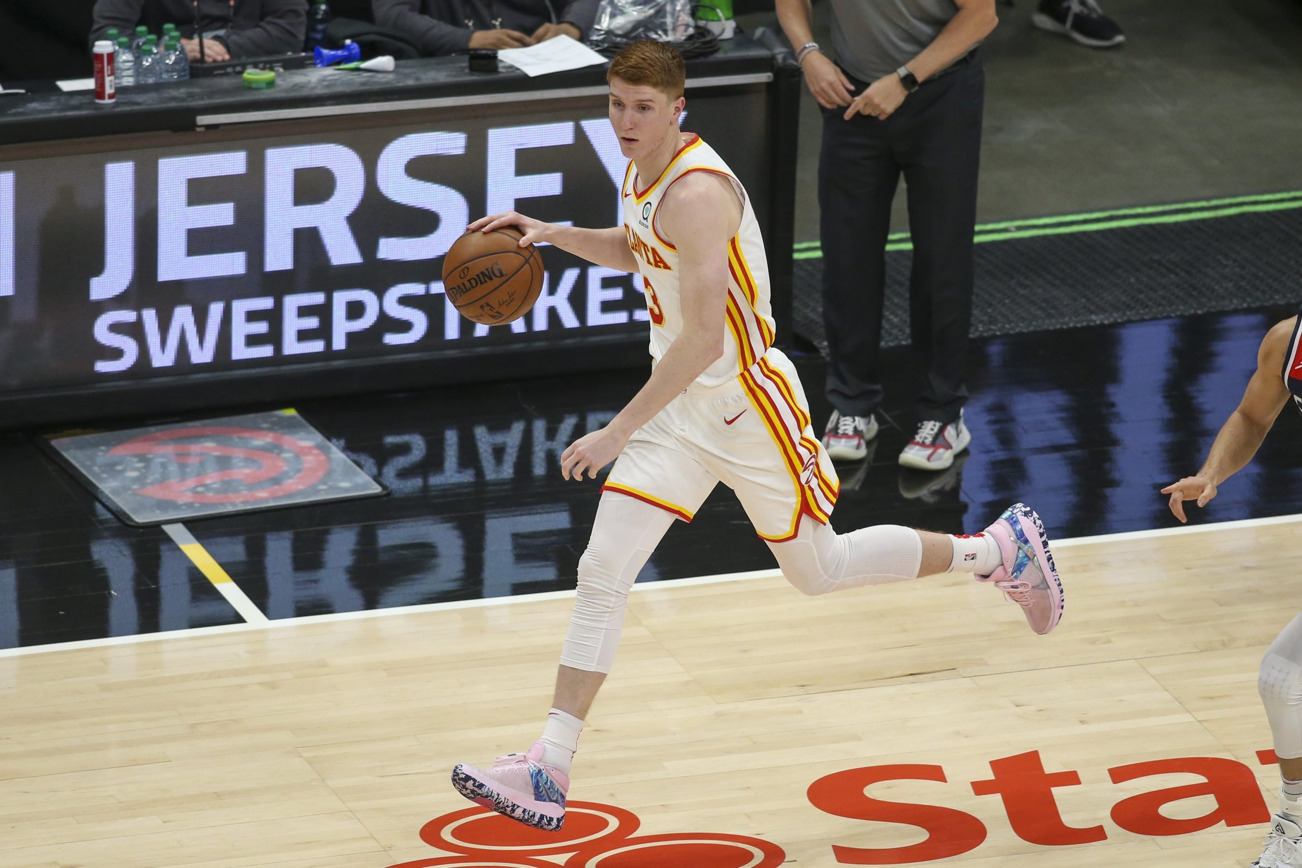 Atlanta Hawks guard Kevin Huerter (3) dribbles against the Washington Wizards in the second quarter at State Farm Arena