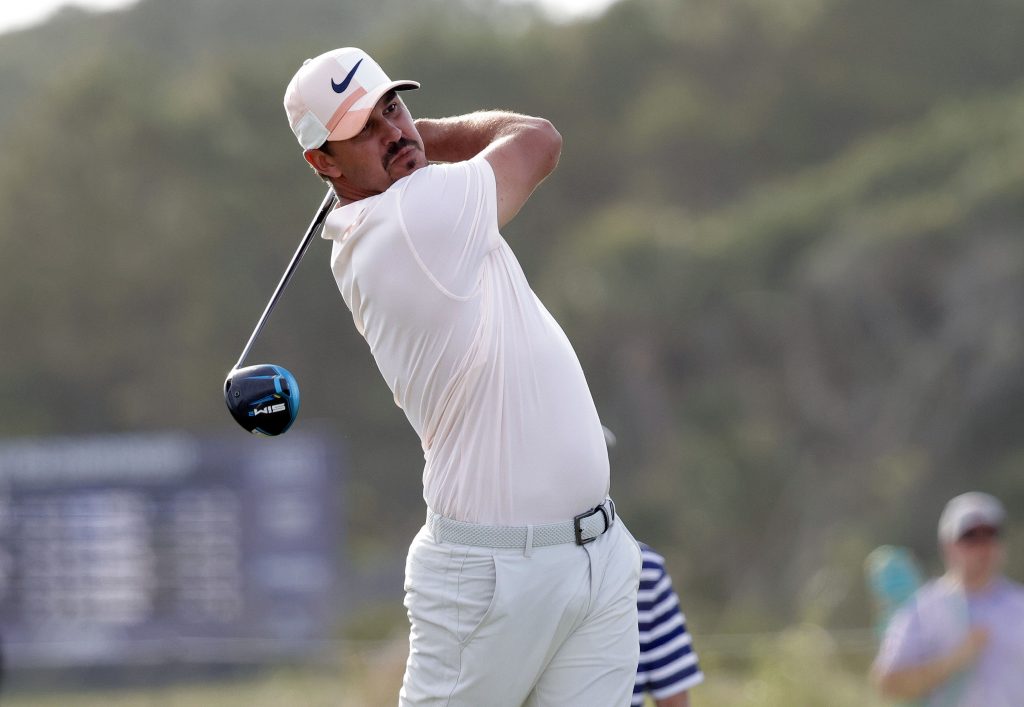 Brooks Koepka hits from the sixteenth tee during the third round of the PGA Championship golf tournament.