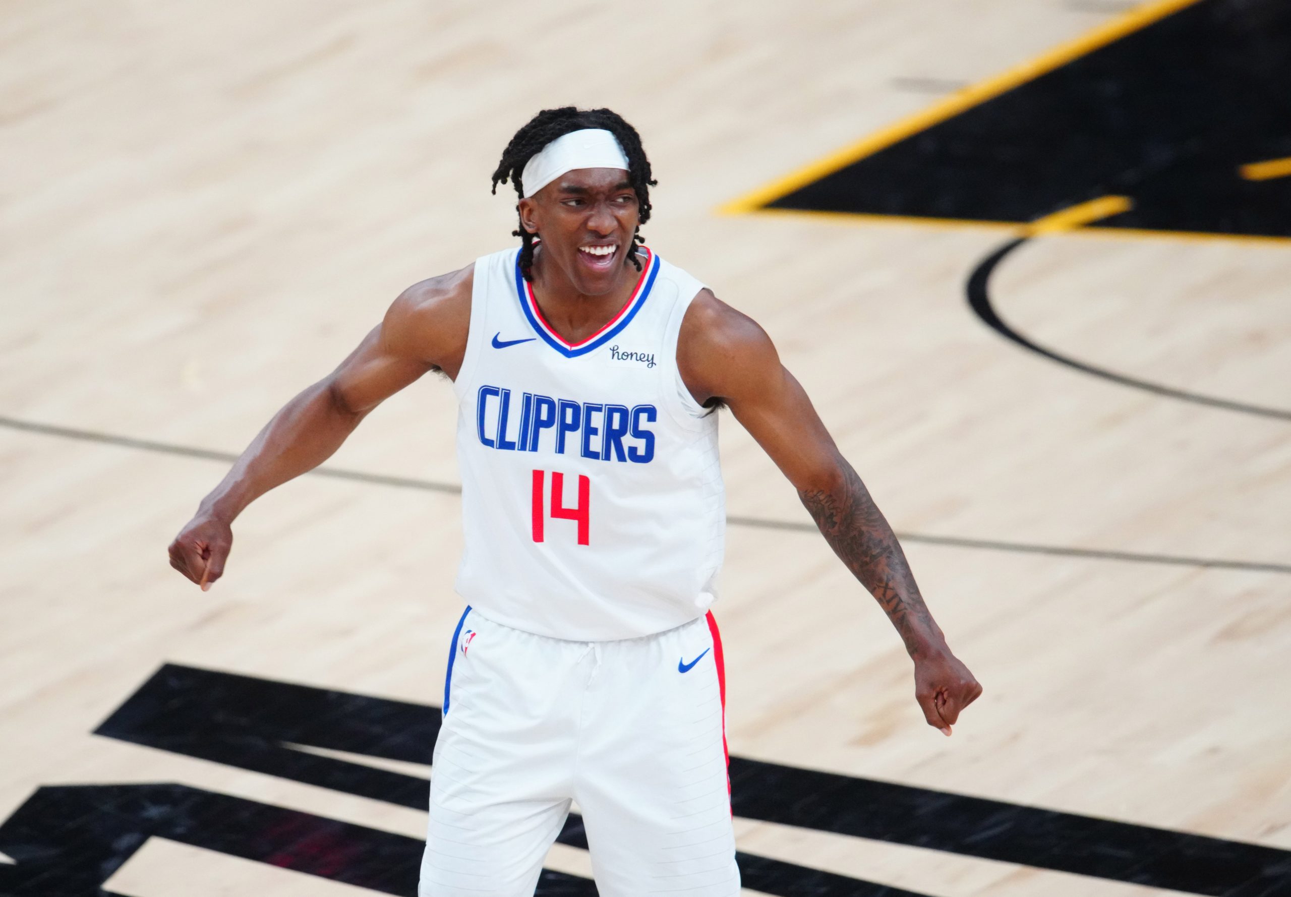 Los Angeles Clippers guard Terance Mann (14) reacts against the Phoenix Suns in the second half during game one of the Western Conference Finals for the 2021 NBA Playoffs at Phoenix Suns Arena.