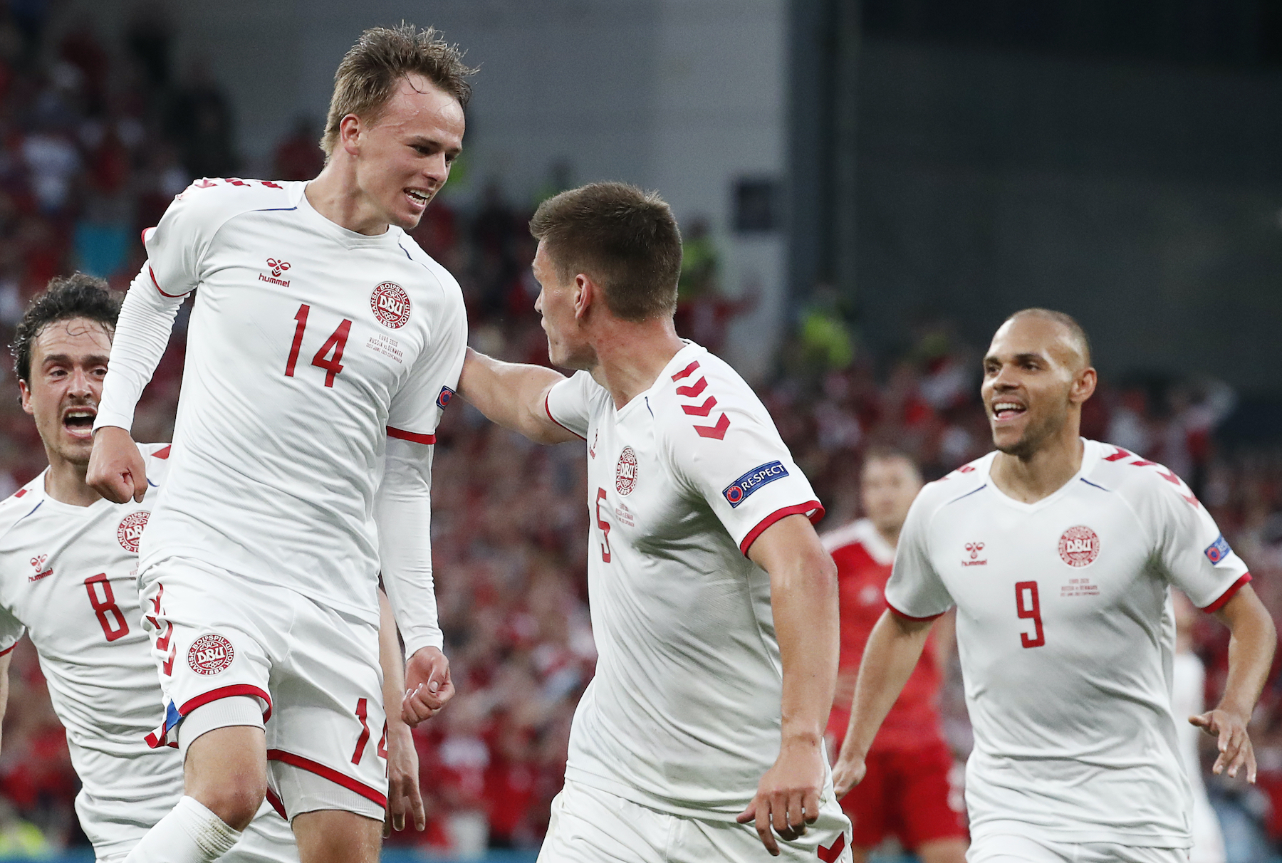 Denmark celebrate opening goal in 4-1 win over Russia