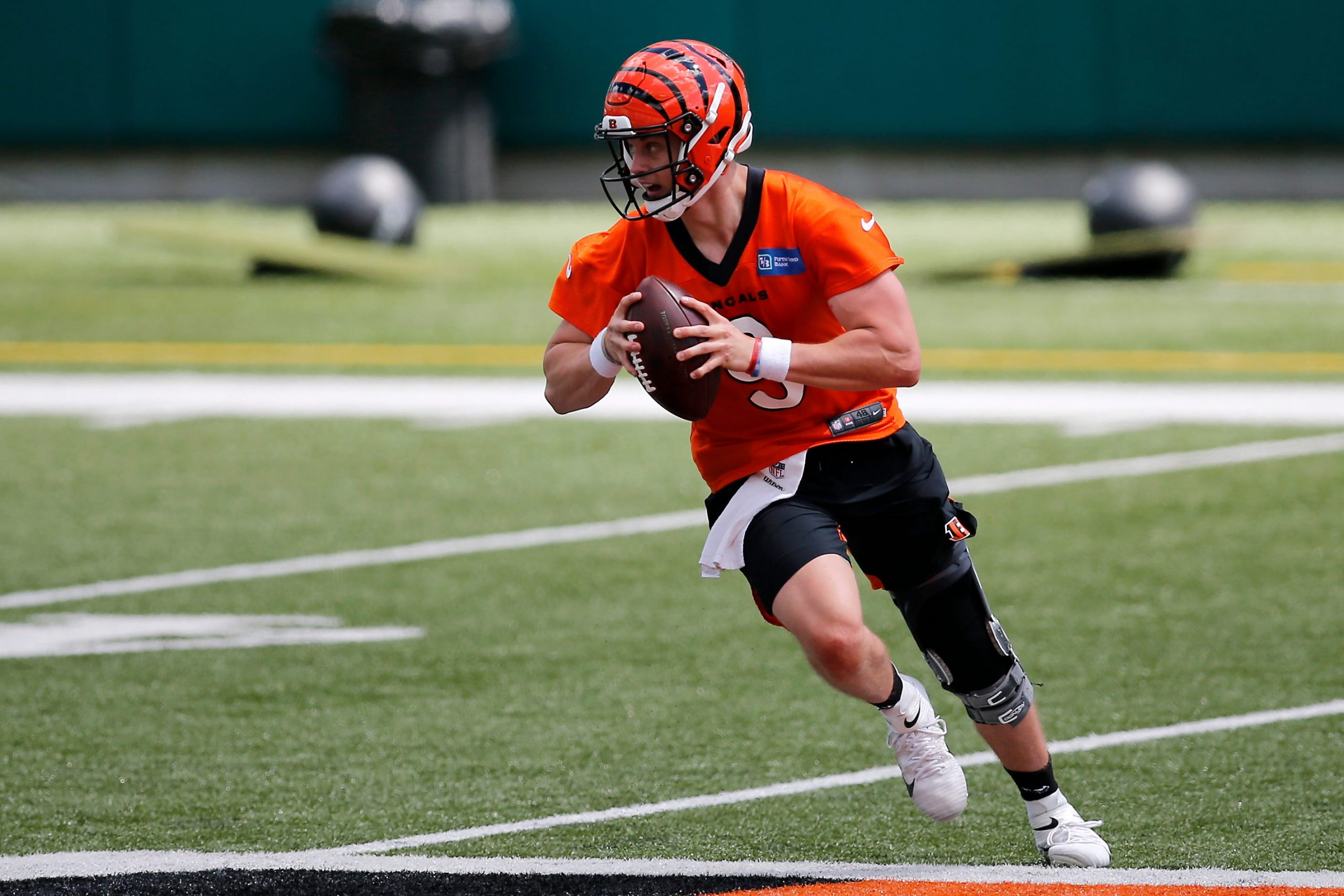 Bengals quarterback Joe Burrow scrambles during a minicamp practice at Paul Brown Stadium in Cincinnati on Tuesday. Cincinnati Bengals Mini Camp.