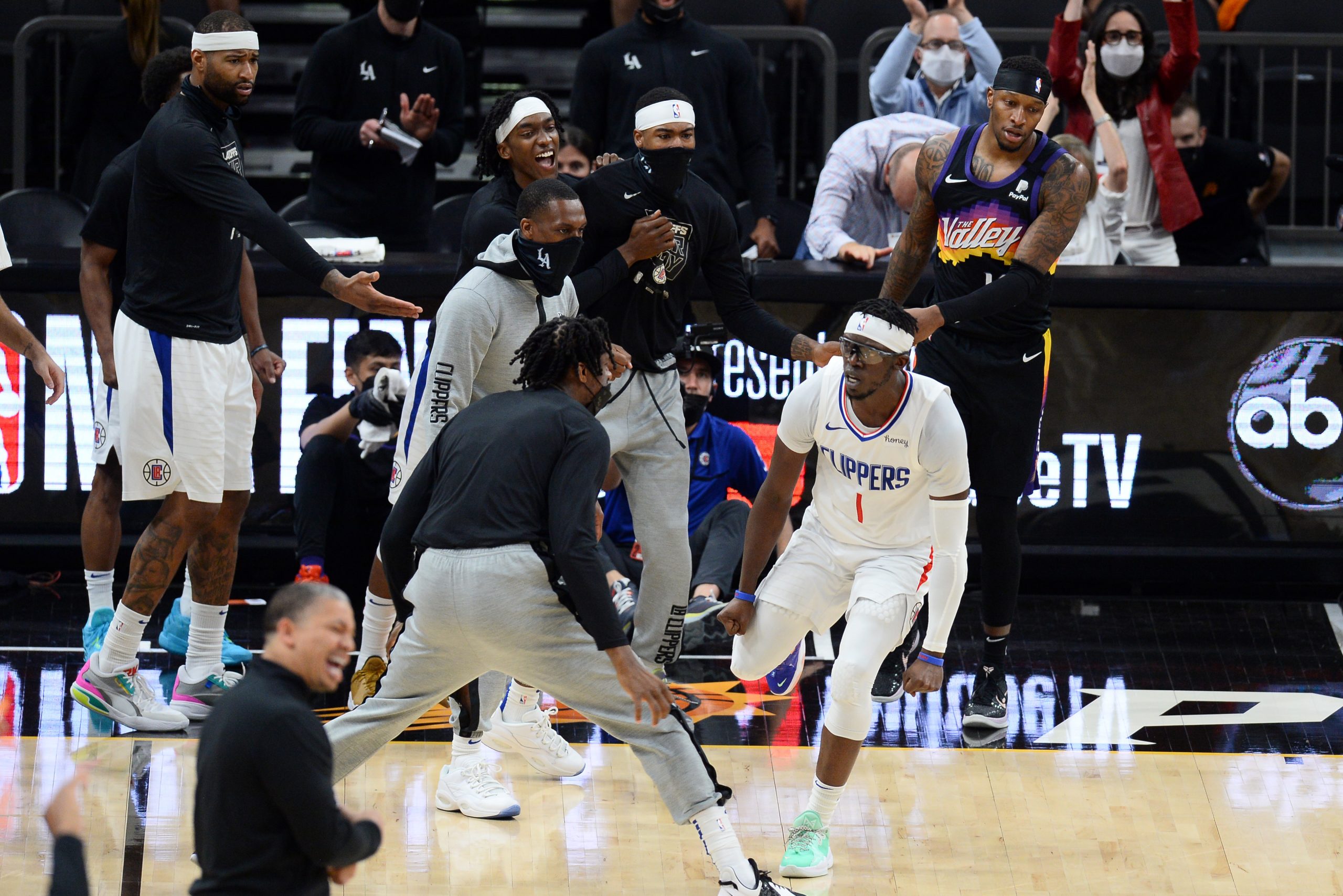 LA Clippers guard Reggie Jackson (1) celebrates against the Phoenix Suns during the second half of game five of the Western Conference Finals for the 2021 NBA Playoffs at Phoenix Suns Arena.