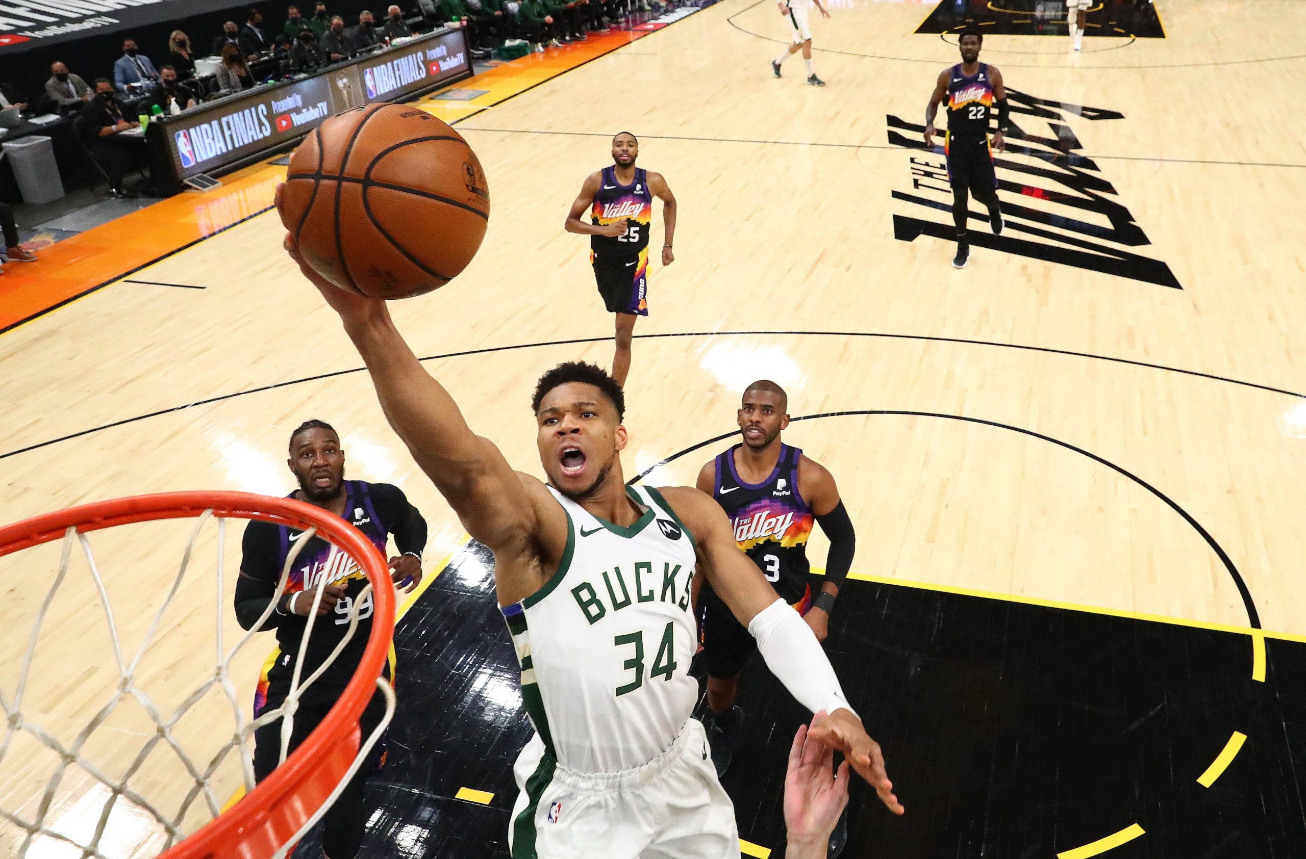 Milwaukee Bucks forward Giannis Antetokounmpo (34) drives to the basket against the Phoenix Suns during game two of the 2021 NBA Finals at Phoenix Suns Arena.