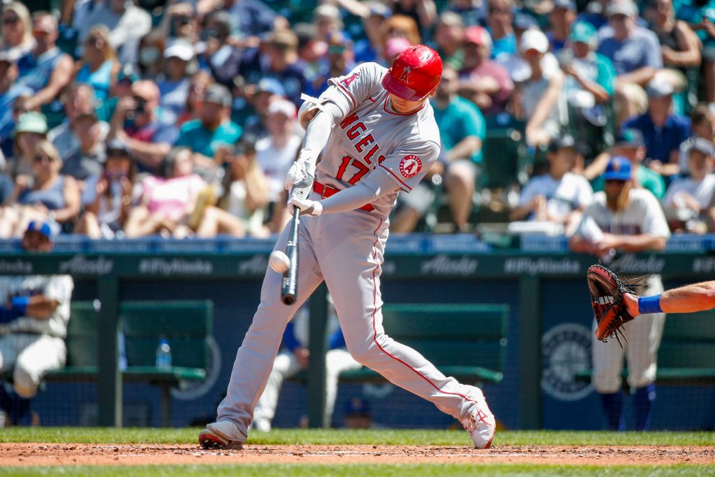 Los Angeles Angels designated hitter Shohei Ohtani (17) makes contact with the ball against the Seattle Mariners during the fifth inning at T-Mobile Park