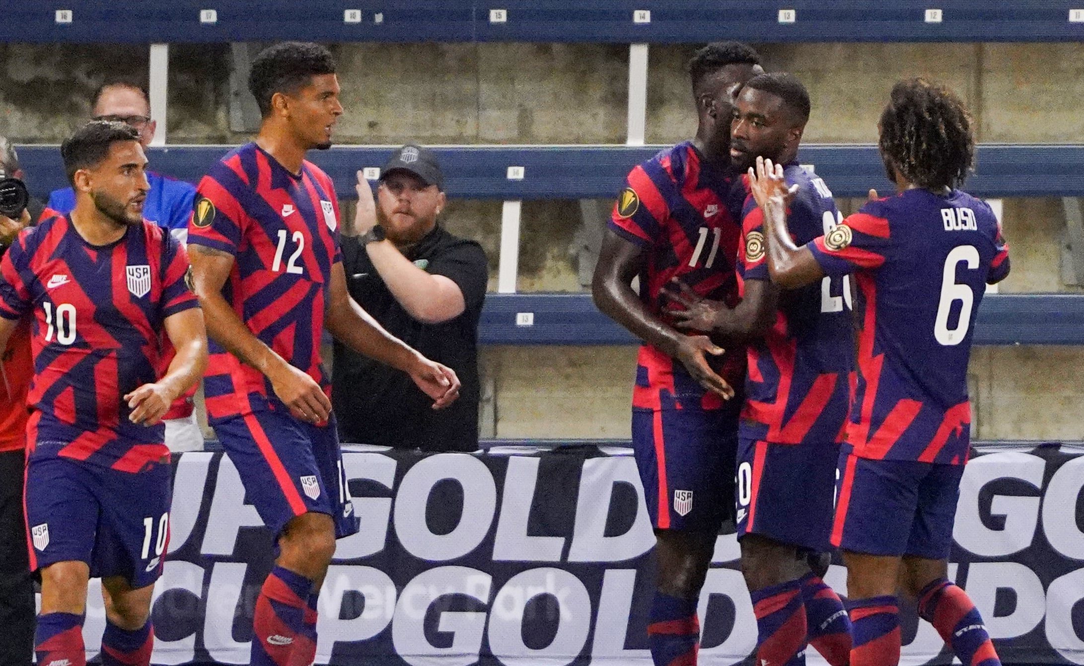 United States forward Daryl Dike (11) celebrates with team mates after scoring a goal against Martinique during CONCACAF Gold Cup Soccer group stage play at Children's Mercy Park.