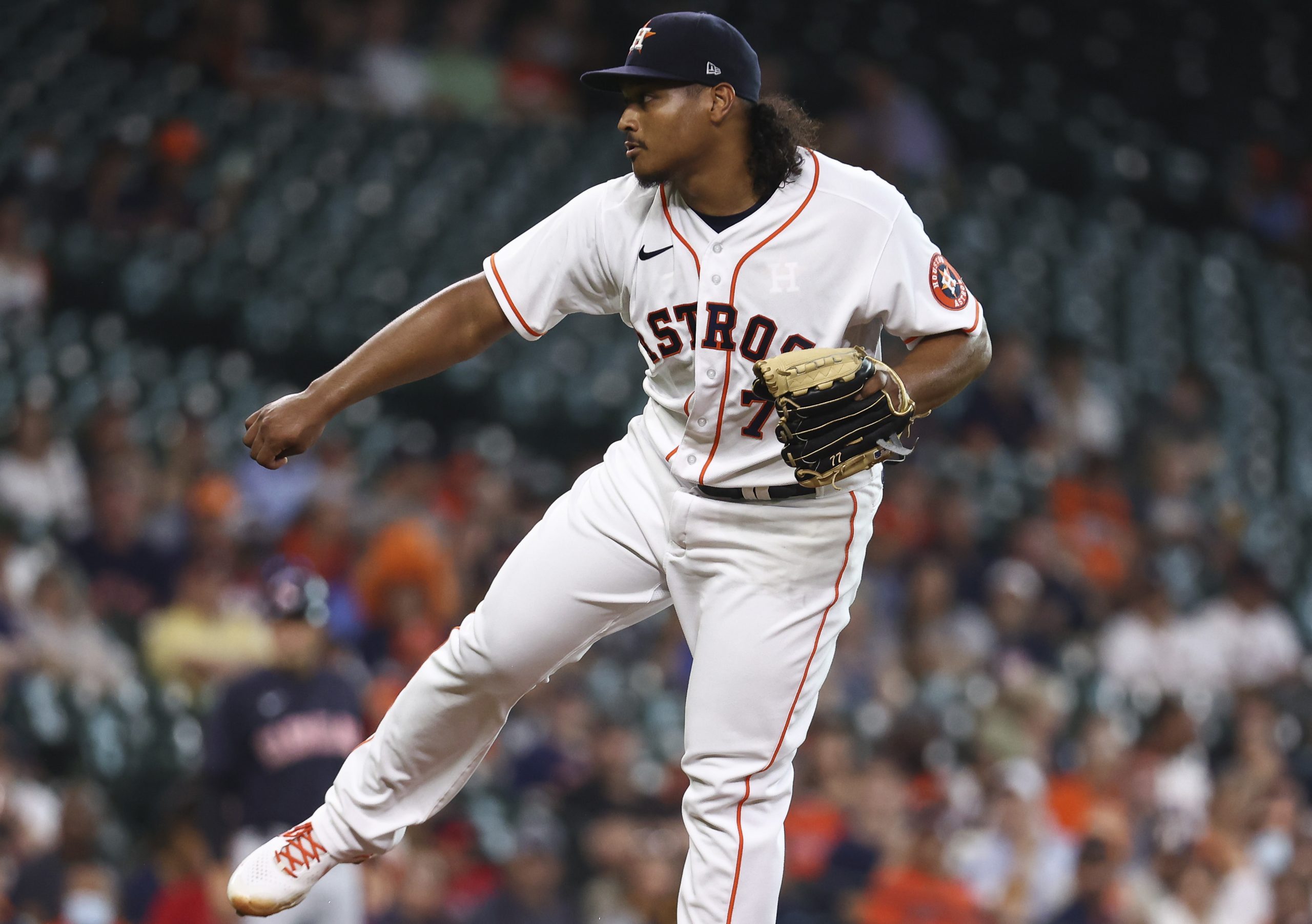 Houston Astros starting pitcher Luis Garcia (77) delivers a pitch during the first inning against the Cleveland Indians at Minute Maid Park