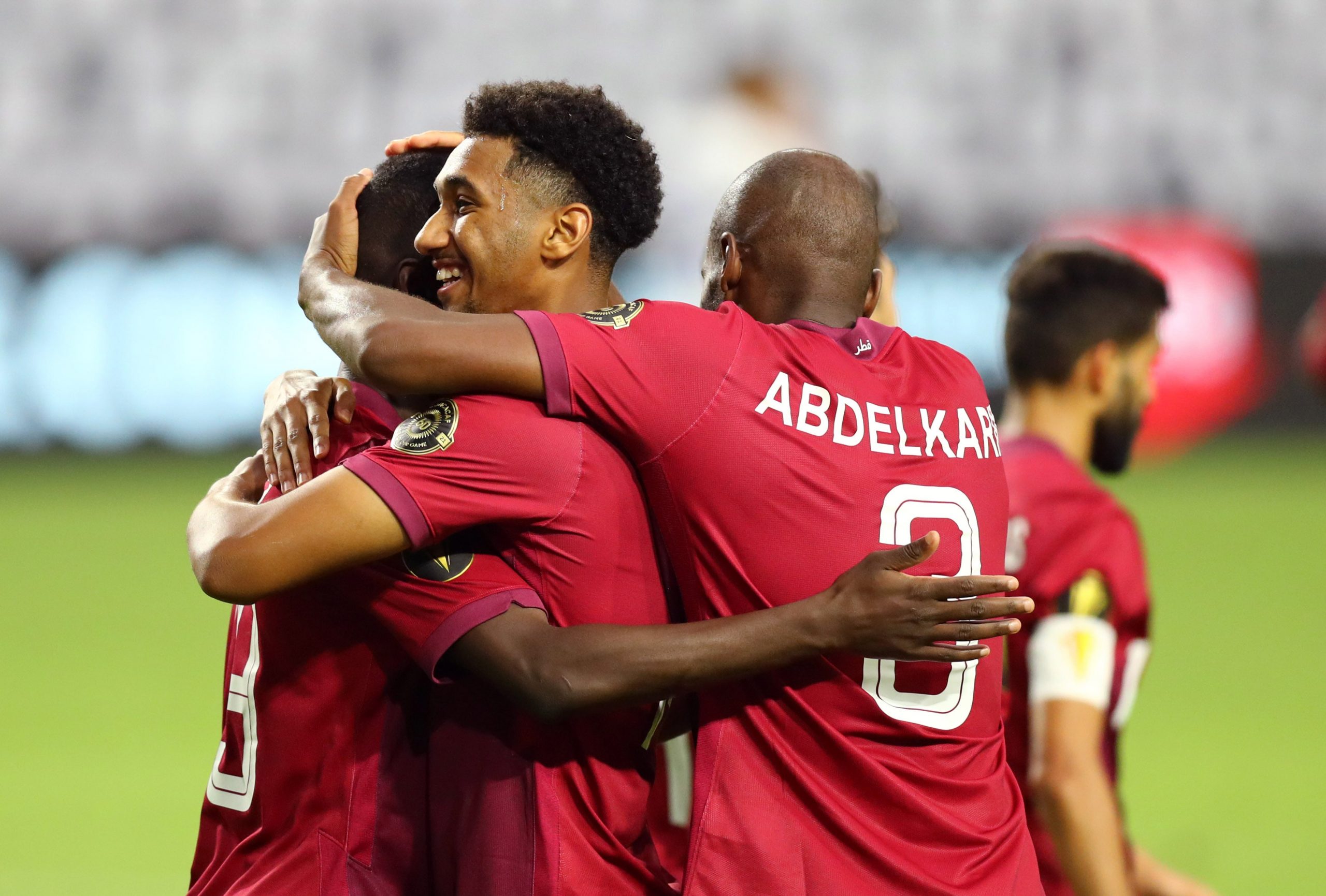 Qatar forward Al Moez Ali (19) celebrates a goal with teammates against El Salvador in the second half during a CONCACAF Gold Cup quarterfinal soccer match at State Farm Stadium.