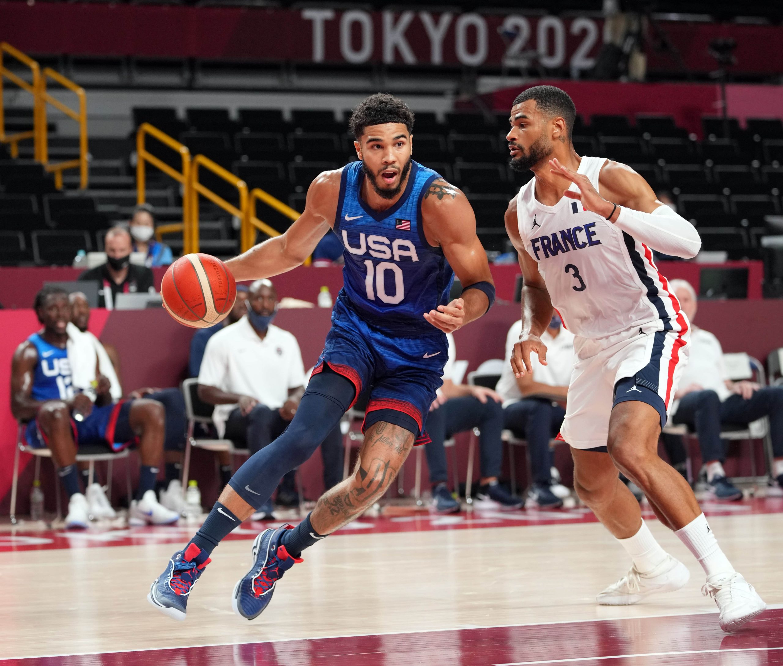 Team United States small forward Jayson Tatum (10) drives to the basket against Team France forward Timothe Luwawu Kongbo (3) during the Tokyo 2020 Olympic Summer Games at Saitama Super Arena.