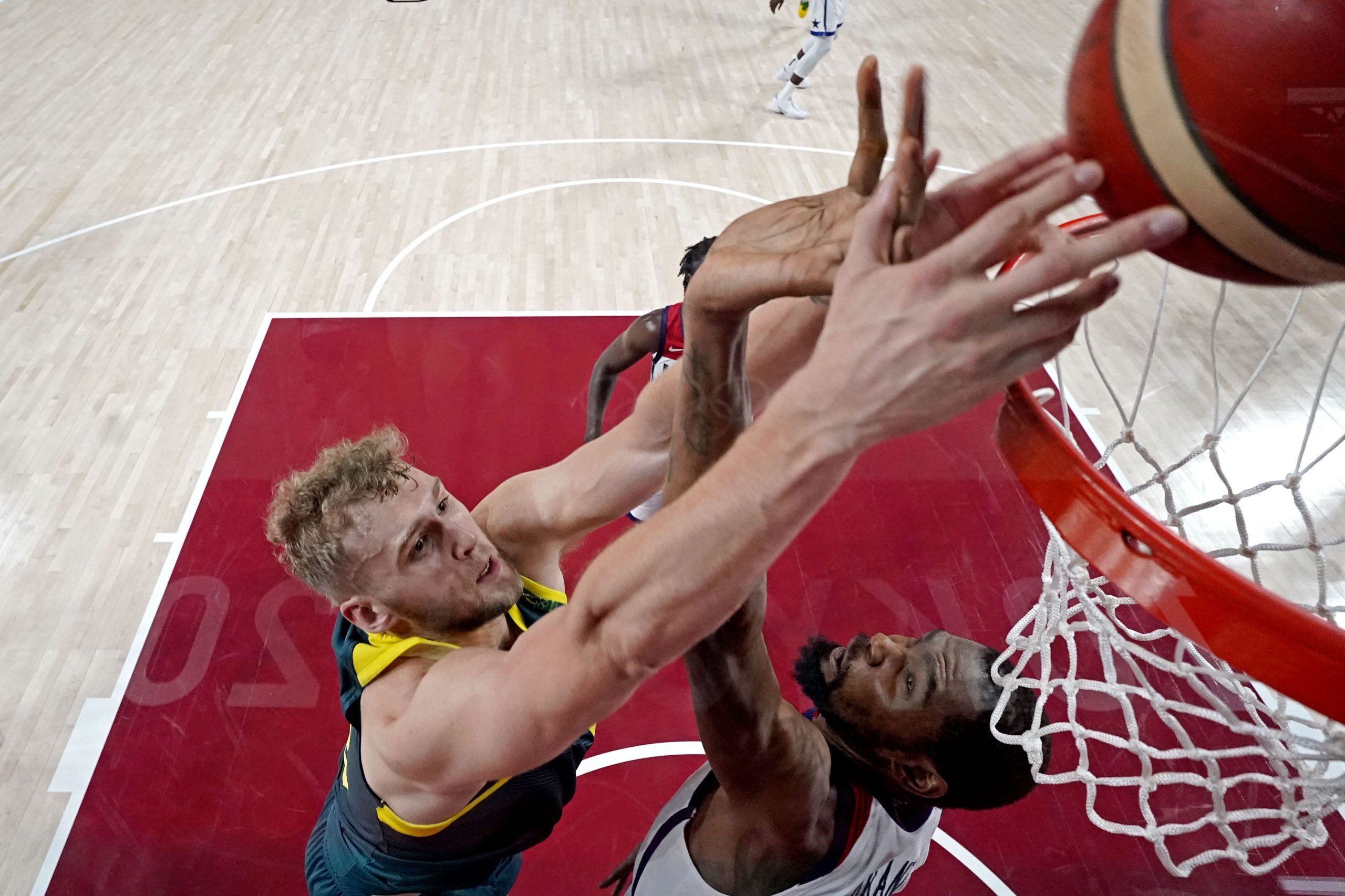 Australia centre Jock Landale (13) shoots the ball against United States forward Kevin Durant (7) in the men's basketball semi final during the Tokyo 2020 Olympic Summer Games at Saitama Super Arena.