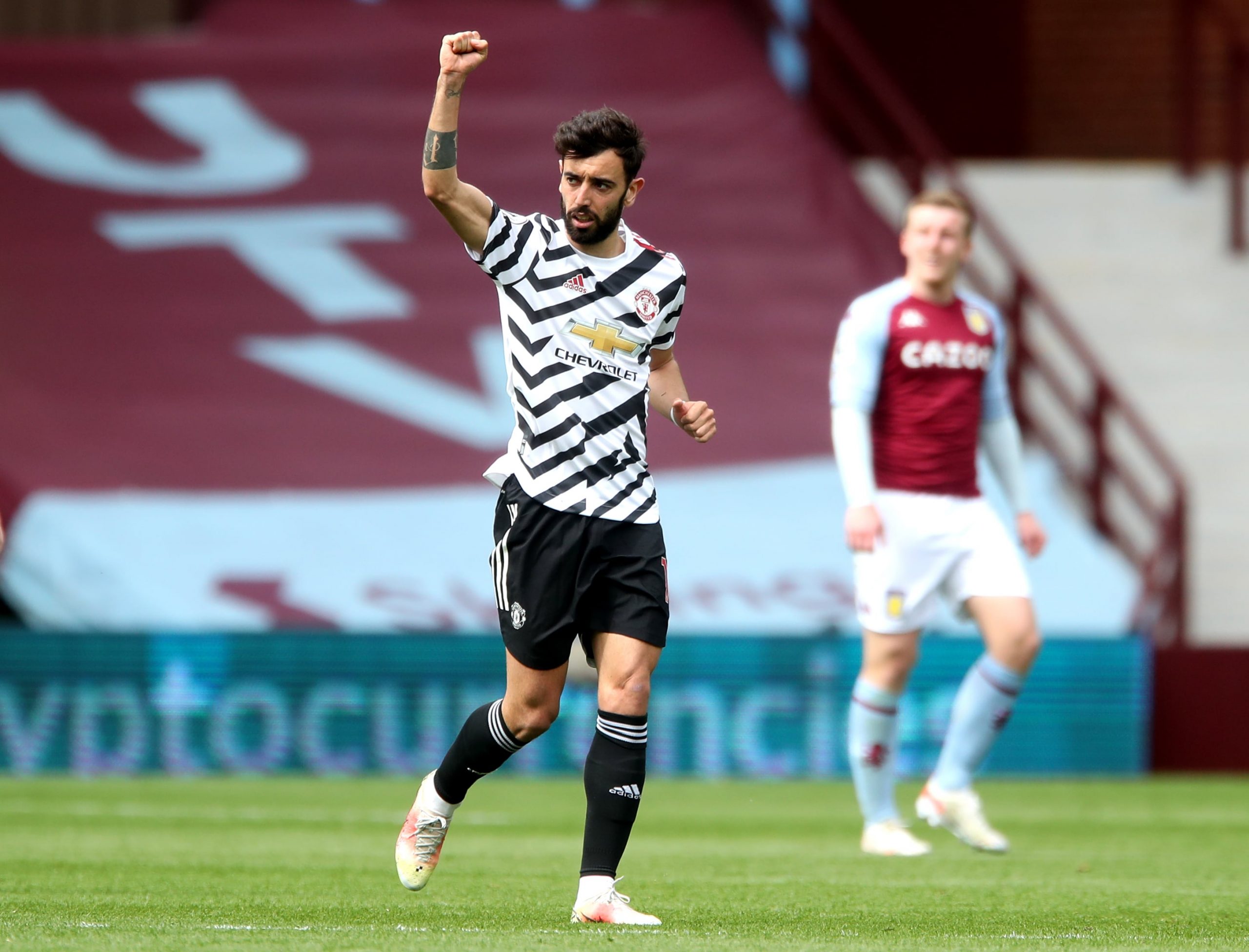 Manchester United's Bruno Fernandes celebrates scoring their side's first goal of the game during the Premier League match at Villa Park, Birmingham.