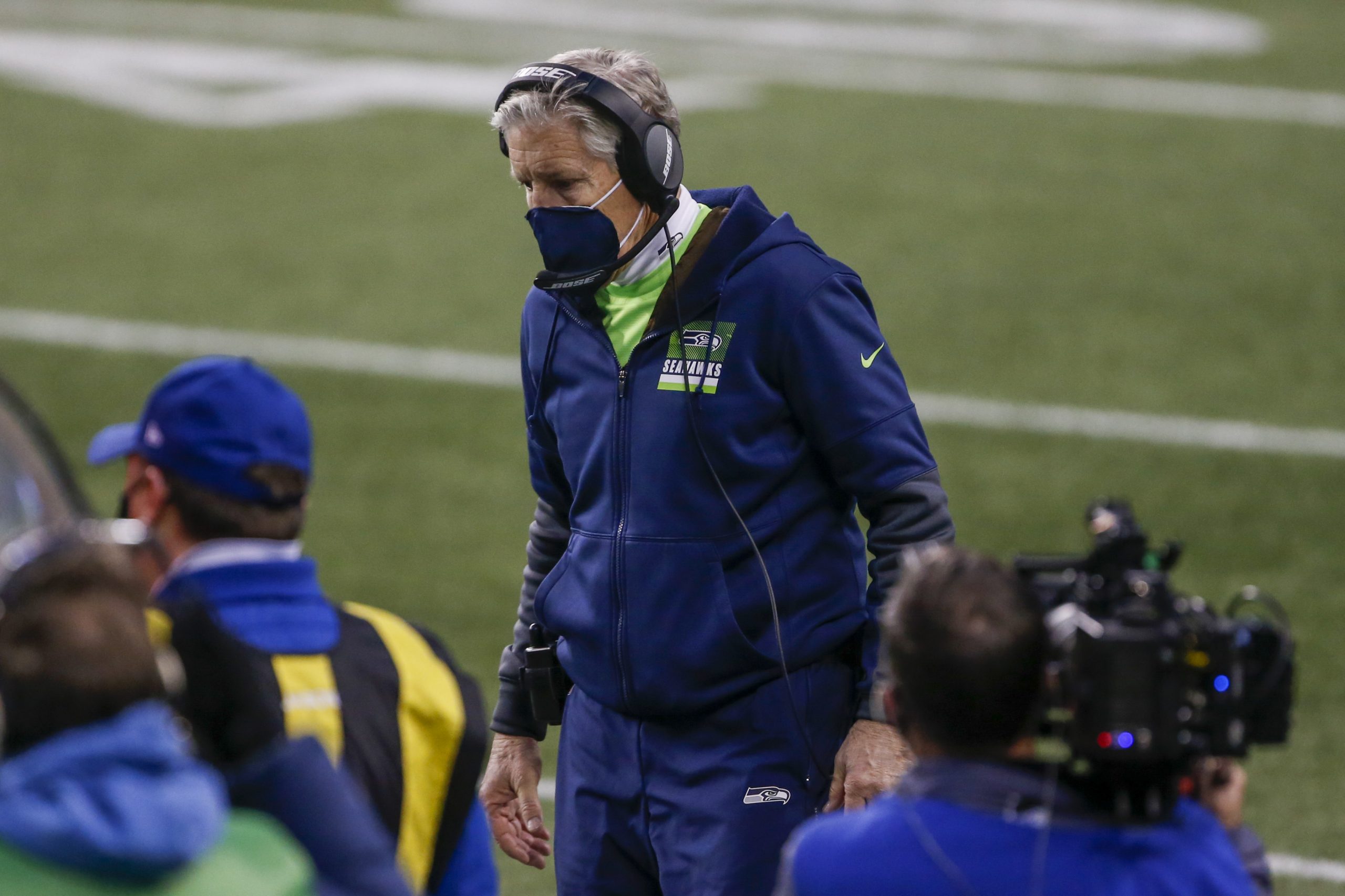 Seattle Seahawks head coach Pete Carroll walks on the sideline during the fourth quarter against the Los Angeles Rams at Lumen Field.