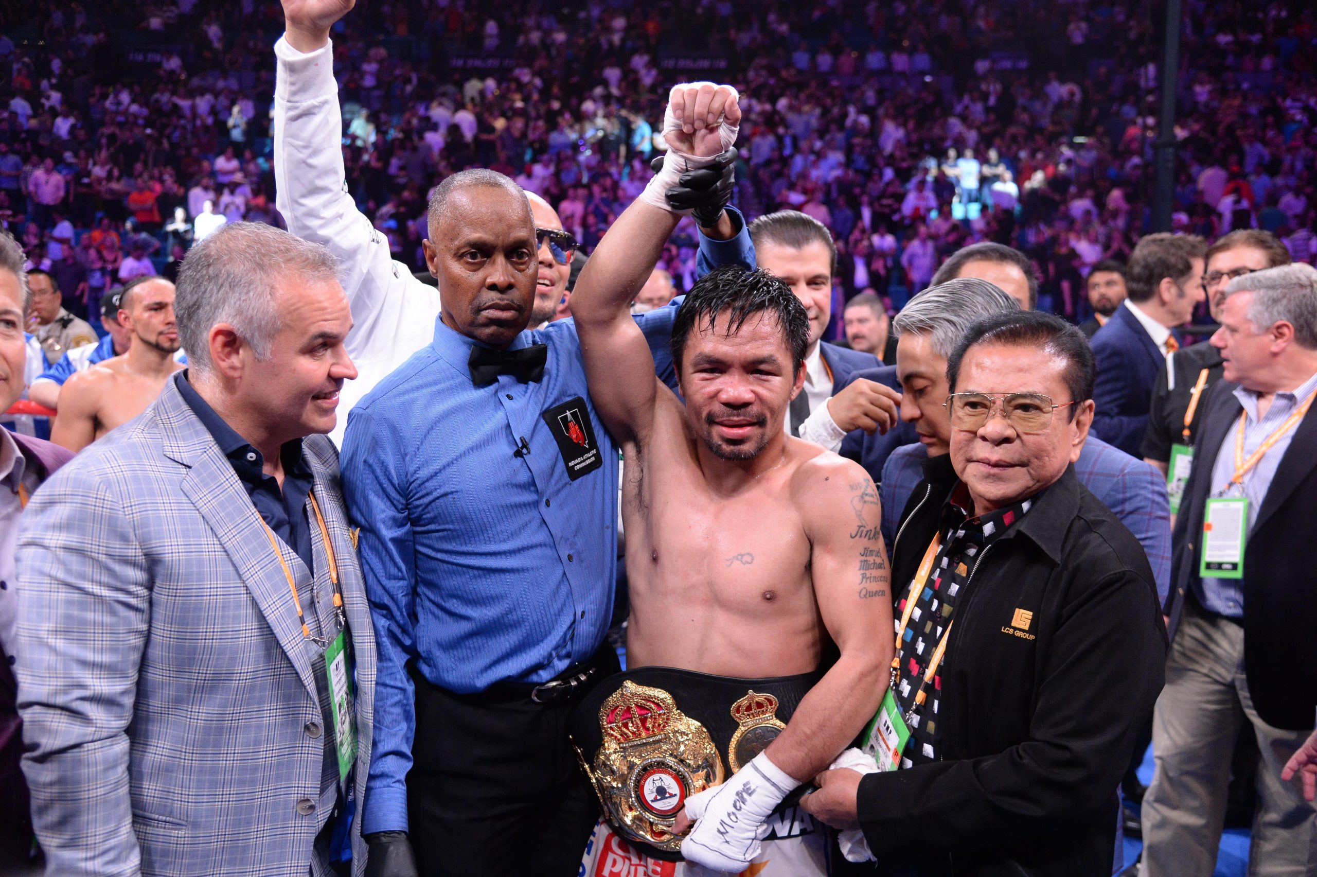 Manny Pacquiao (white trunks) celebrates after defeating Keith Thurman (not pictured) in their WBA welterweight championship bout at MGM Grand Garden Arena. Pacquiao won via split decision.