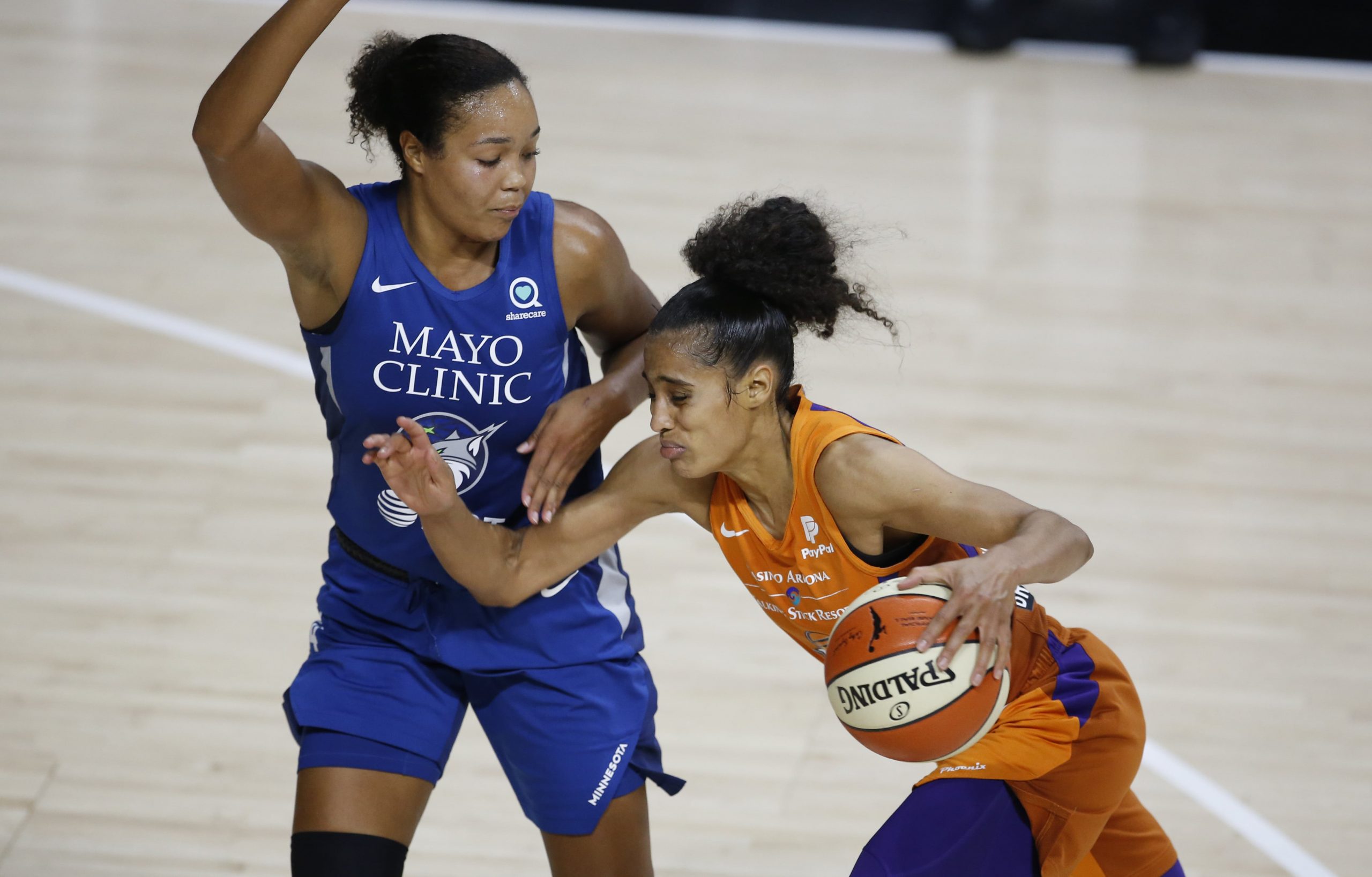 Minnesota Lynx forward Napheesa Collier defends Phoenix Mercury guard Skylar Diggins-Smith