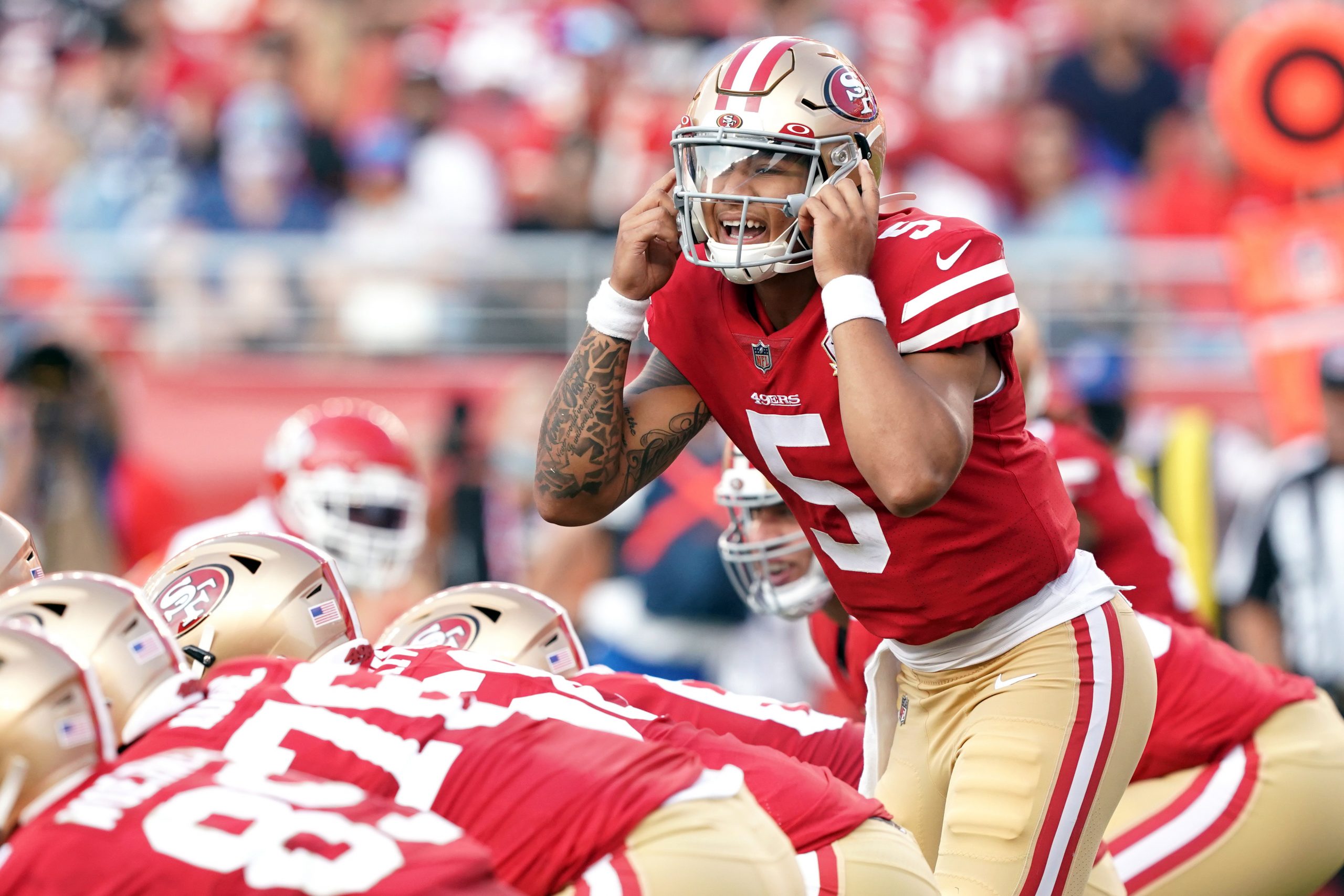 San Francisco 49ers quarterback Trey Lance (5) gestures during the second quarter of a preseason gameagainst the Kansas City Chiefs at Levi's Stadium.