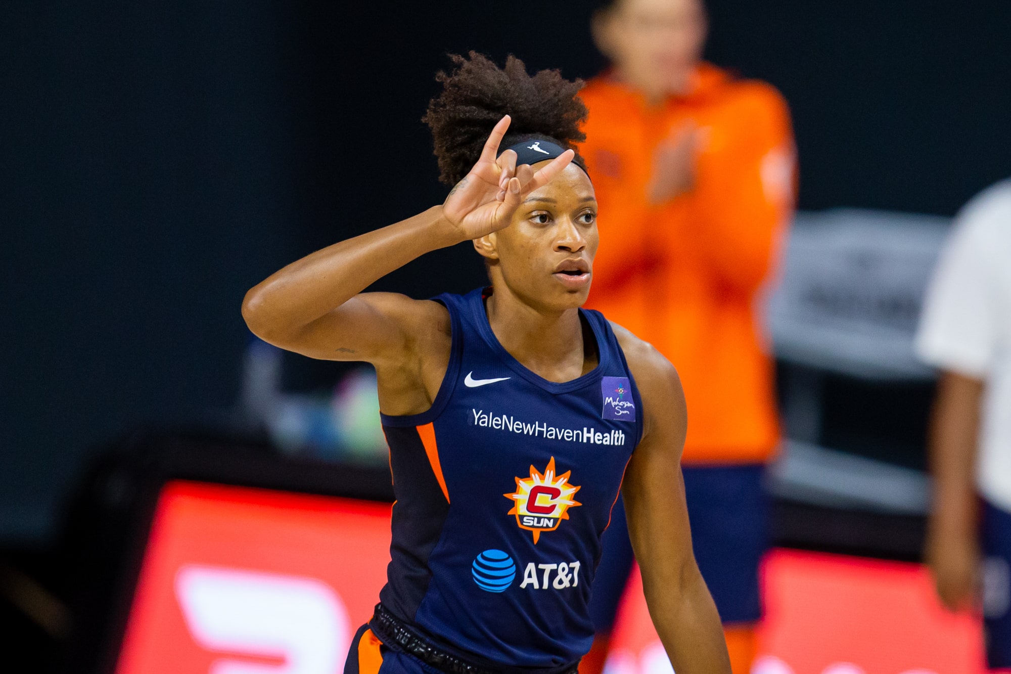 Connecticut Sun guard Jasmine Thomas signals a play call.