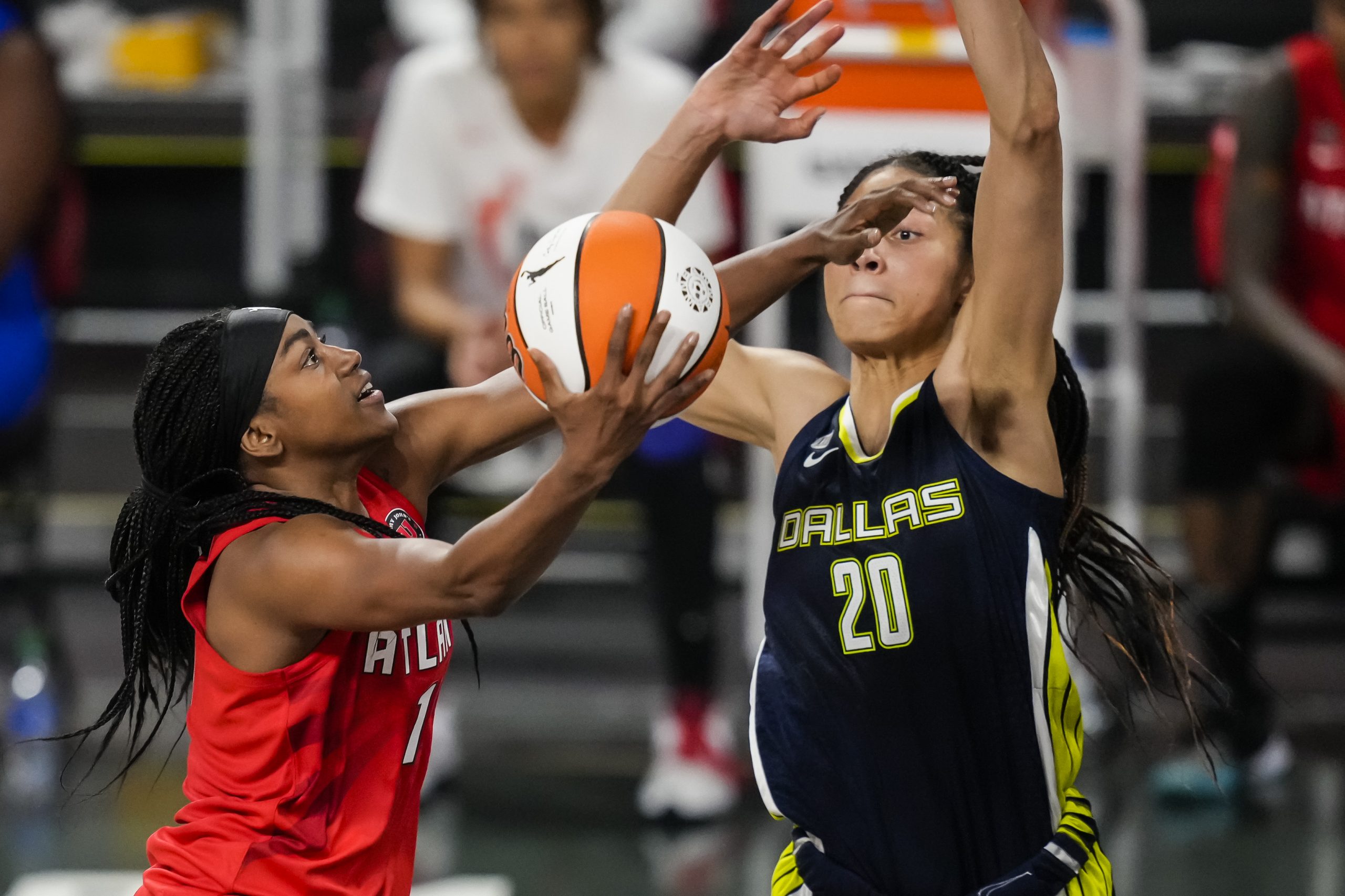 Atlanta Dream's forward Elizabeth Williams drives on Dallas Wing's forward Isabelle Harrison.