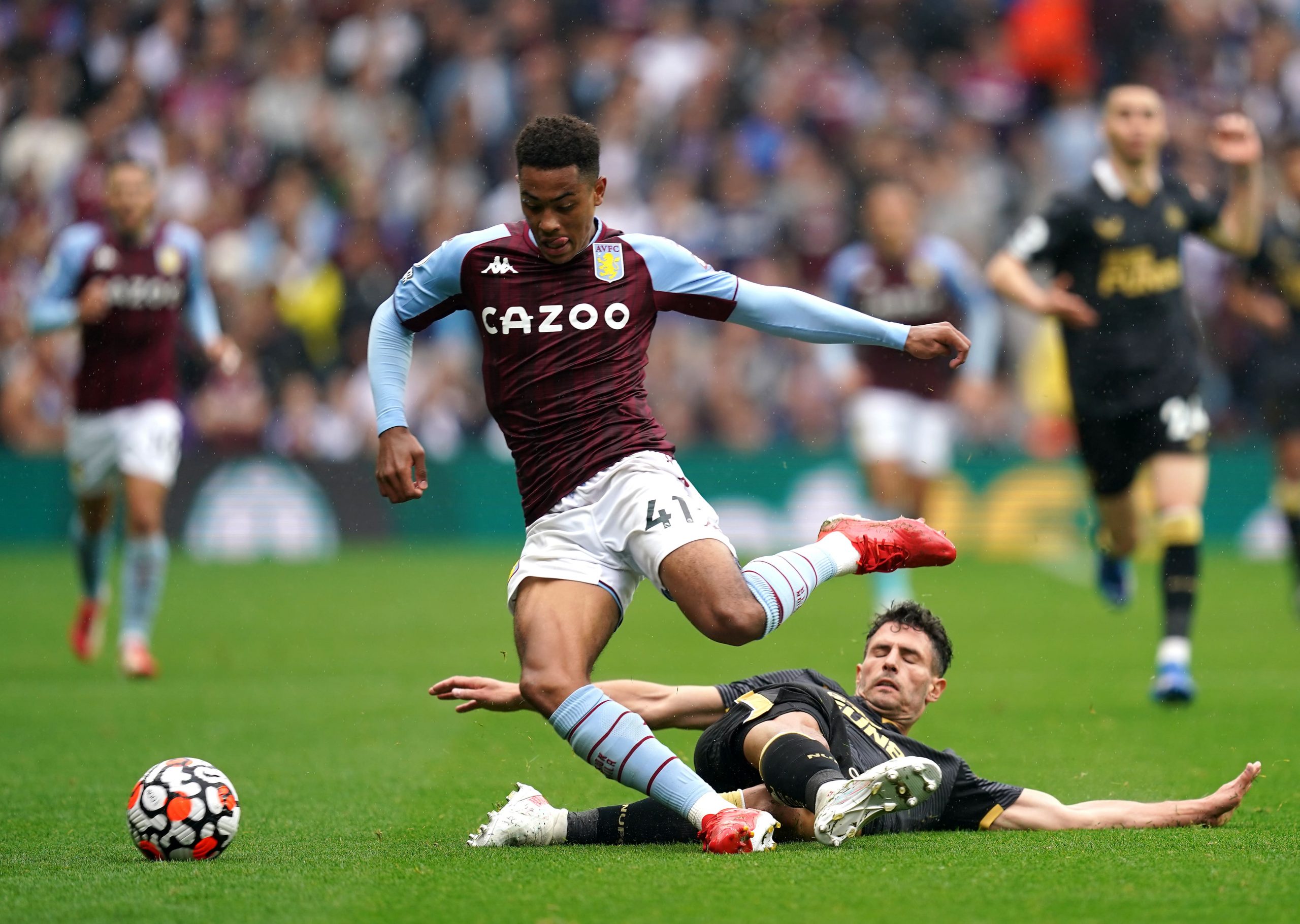 Newcastle United's Fabian Schar (right) tackles Aston Villa's Jacob Ramsey during the Premier League match at Villa Park, Birmingham.