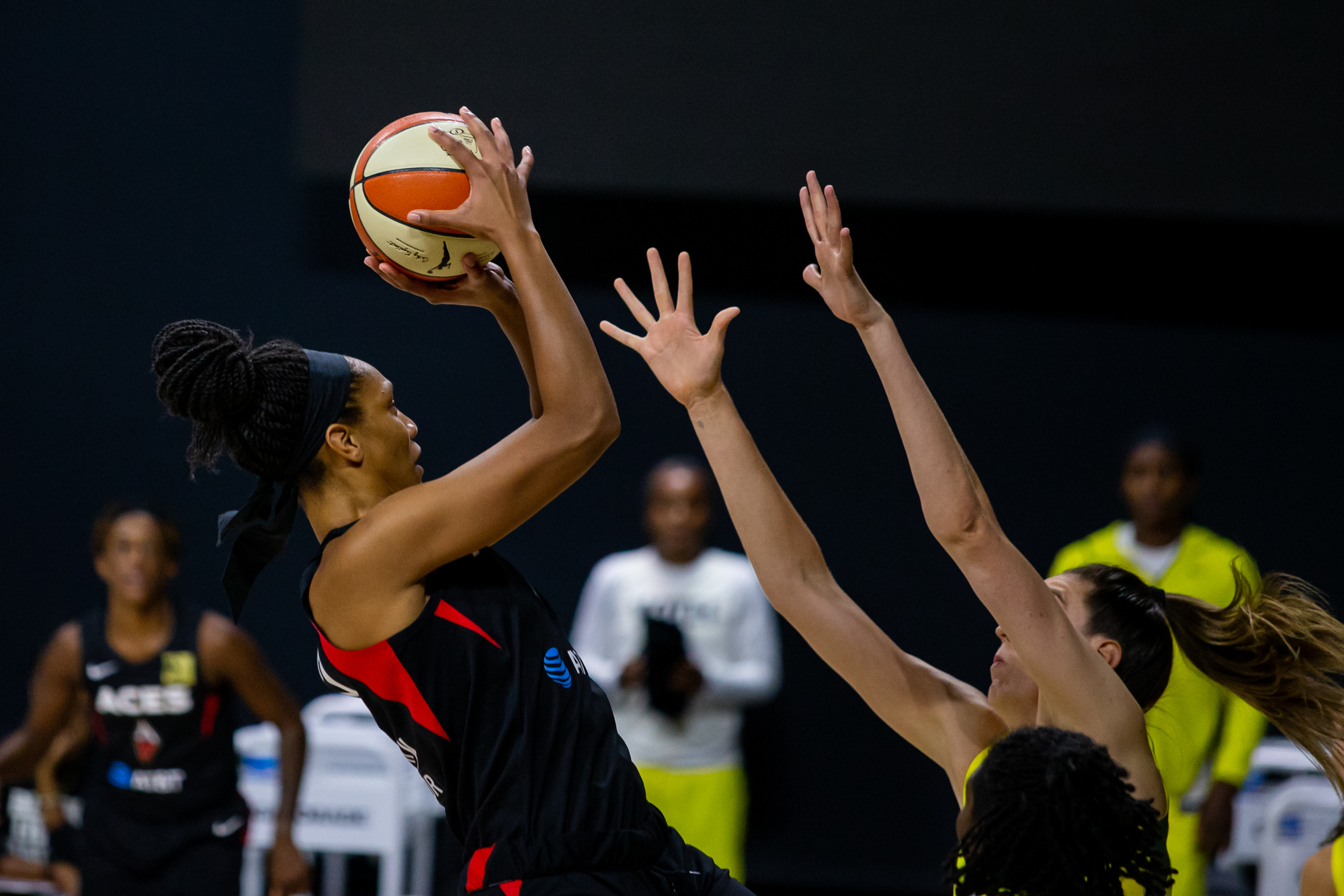 Las Vegas Aces forward A'ja Wilson shoots over Seattle Storm player Breanna Stewart.