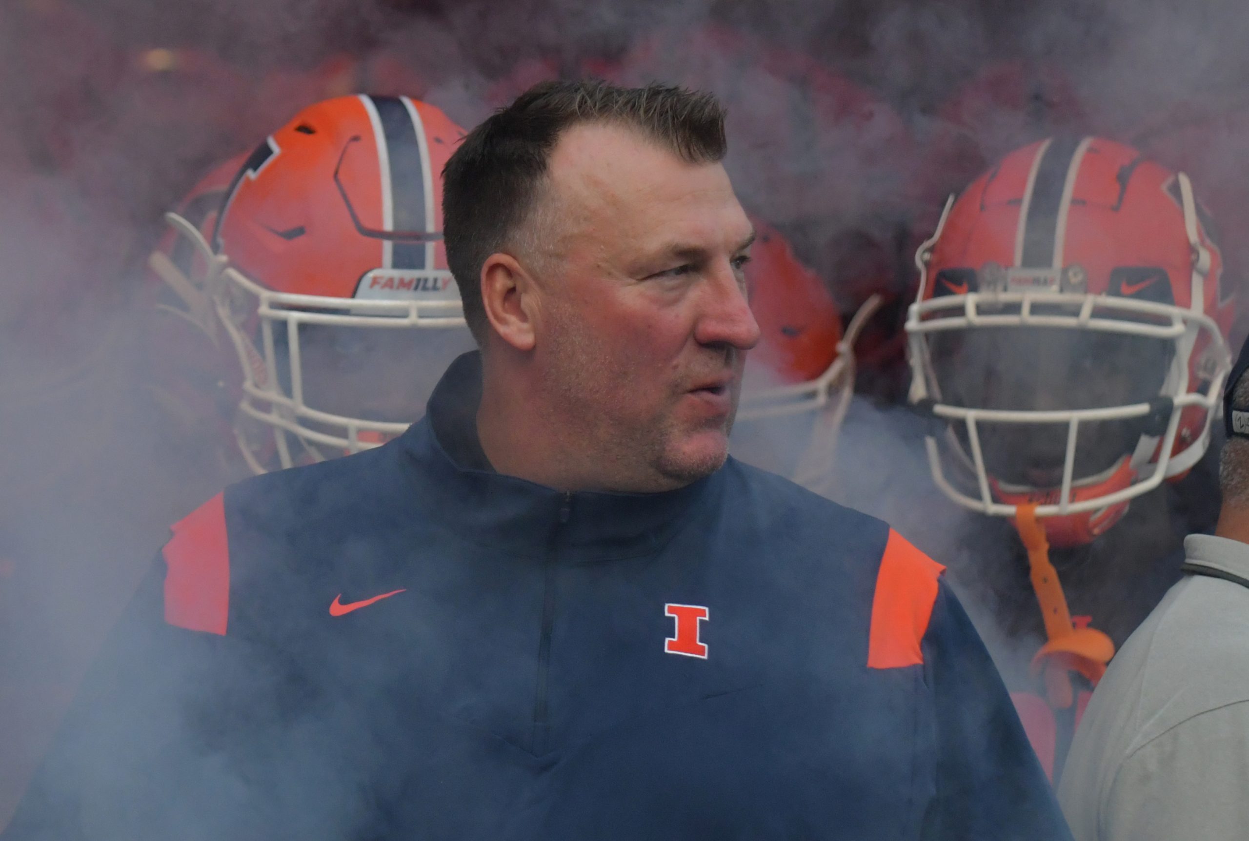 Illinois Fighting Illini head coach Bret Bielema enters the field with his team before the start of Saturday s game with the UTSA Roadrunners at Memorial Stadium