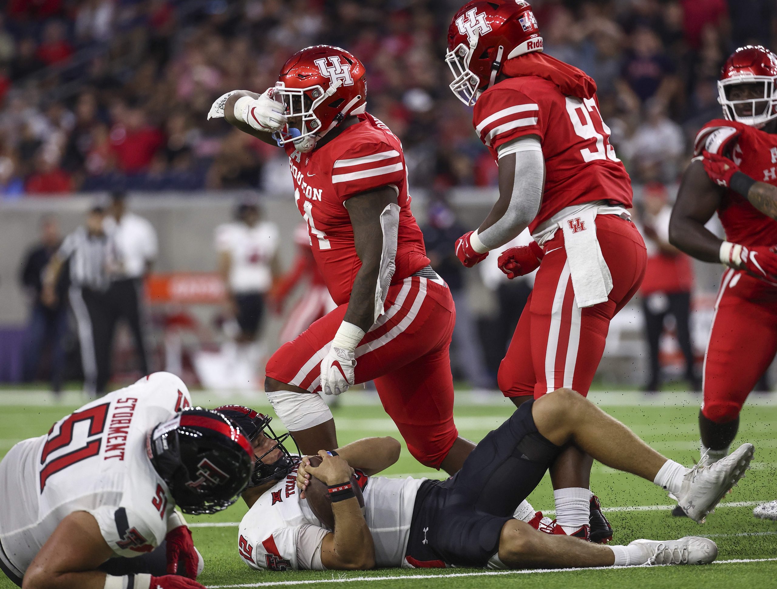 Houston Cougars defensive lineman D'Anthony Jones (44) reacts after sacking Texas Tech Red Raiders quarterback Tyler Shough (12) during the first half at NRG Stadium college football
