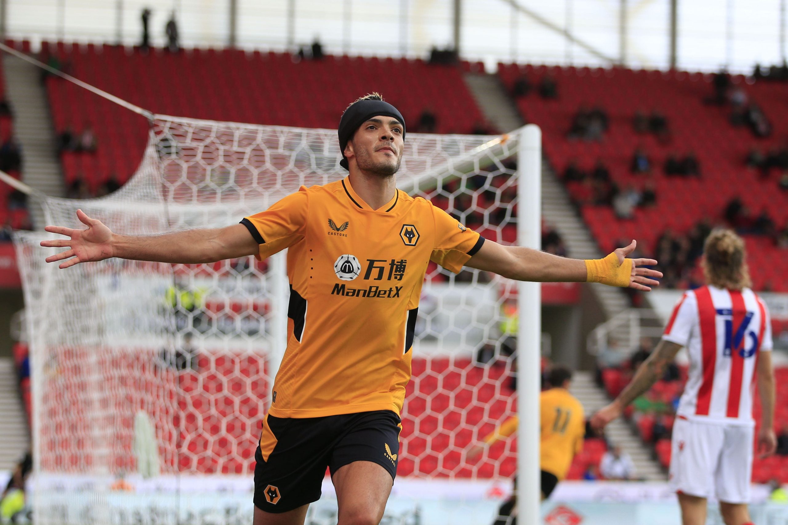 Raul Jimenez #9 of Wolverhampton Wanderers celebrates scoring to make it 1-1 in Stoke-on-Trent, United Kingdom