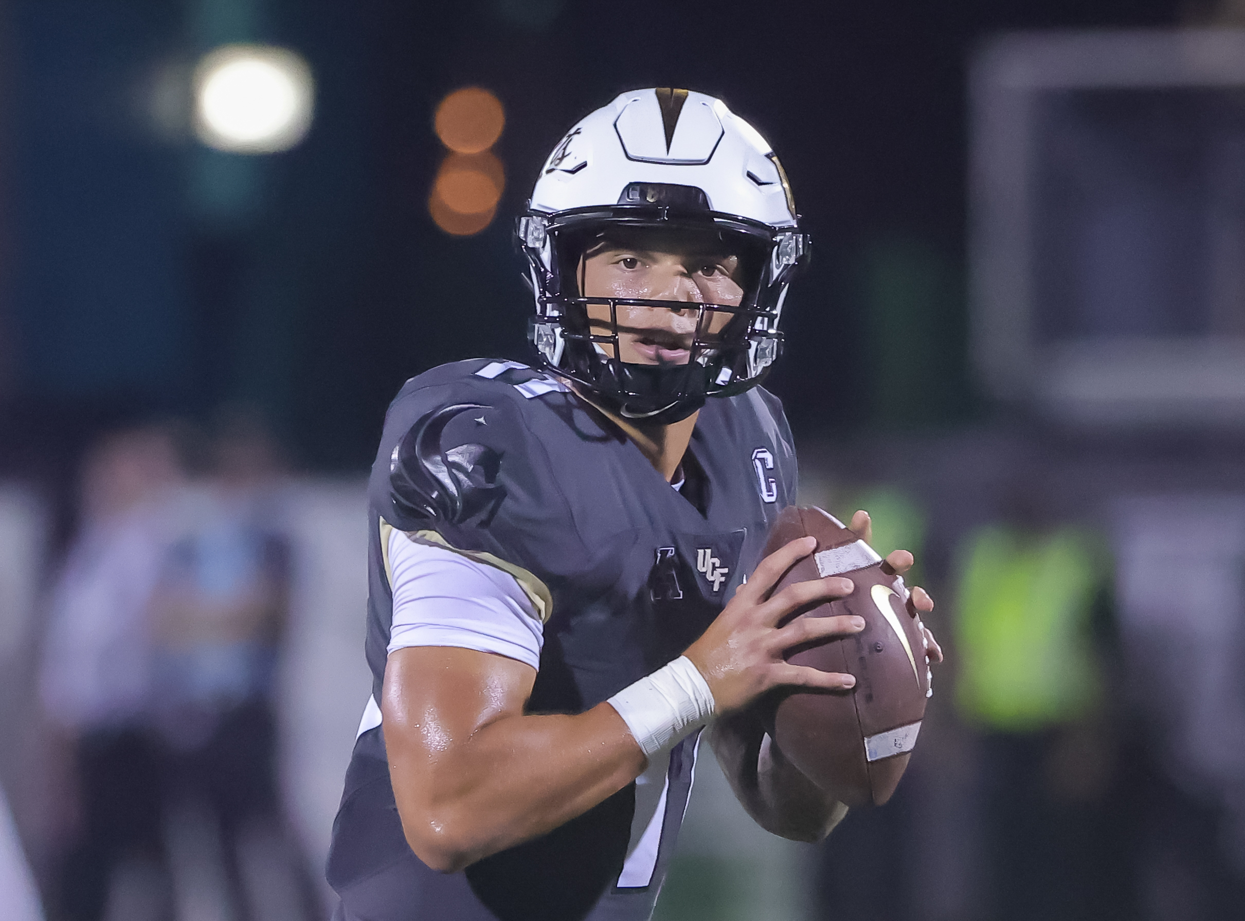 Sep 11, 2021; Orlando, Florida, USA; UCF Knights quarterback Dillon Gabriel (11) looks to pass during the second half against the Bethune Cookman Wildcats at Bounce House.
