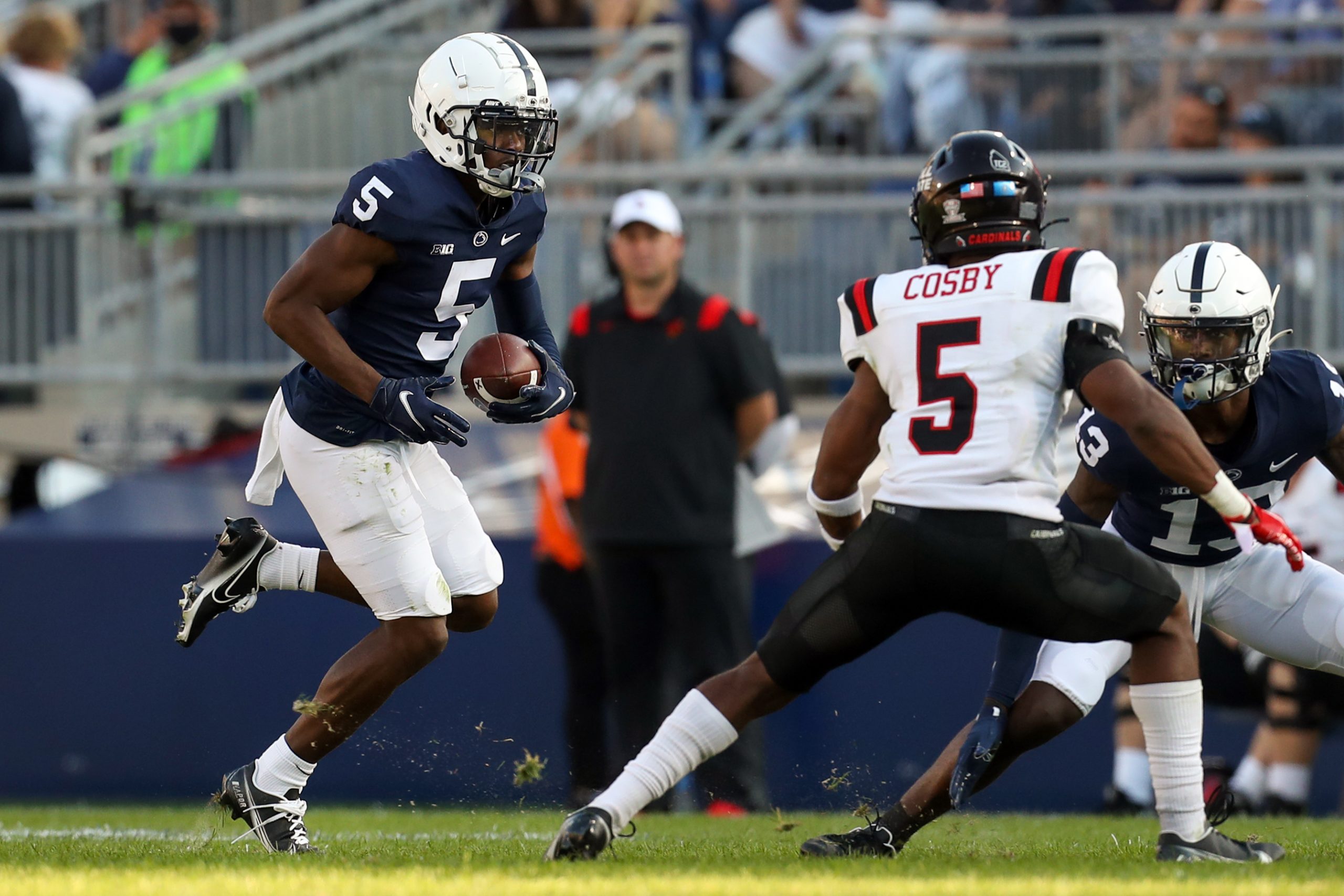 Sep 11, 2021; University Park, Pennsylvania, USA; Penn State Nittany Lions wide receiver Jahan Dotson (5) runs with the ball during the fourth quarter against the Ball State Cardinals at Beaver Stadium. Penn State defeated Ball State 44-13.