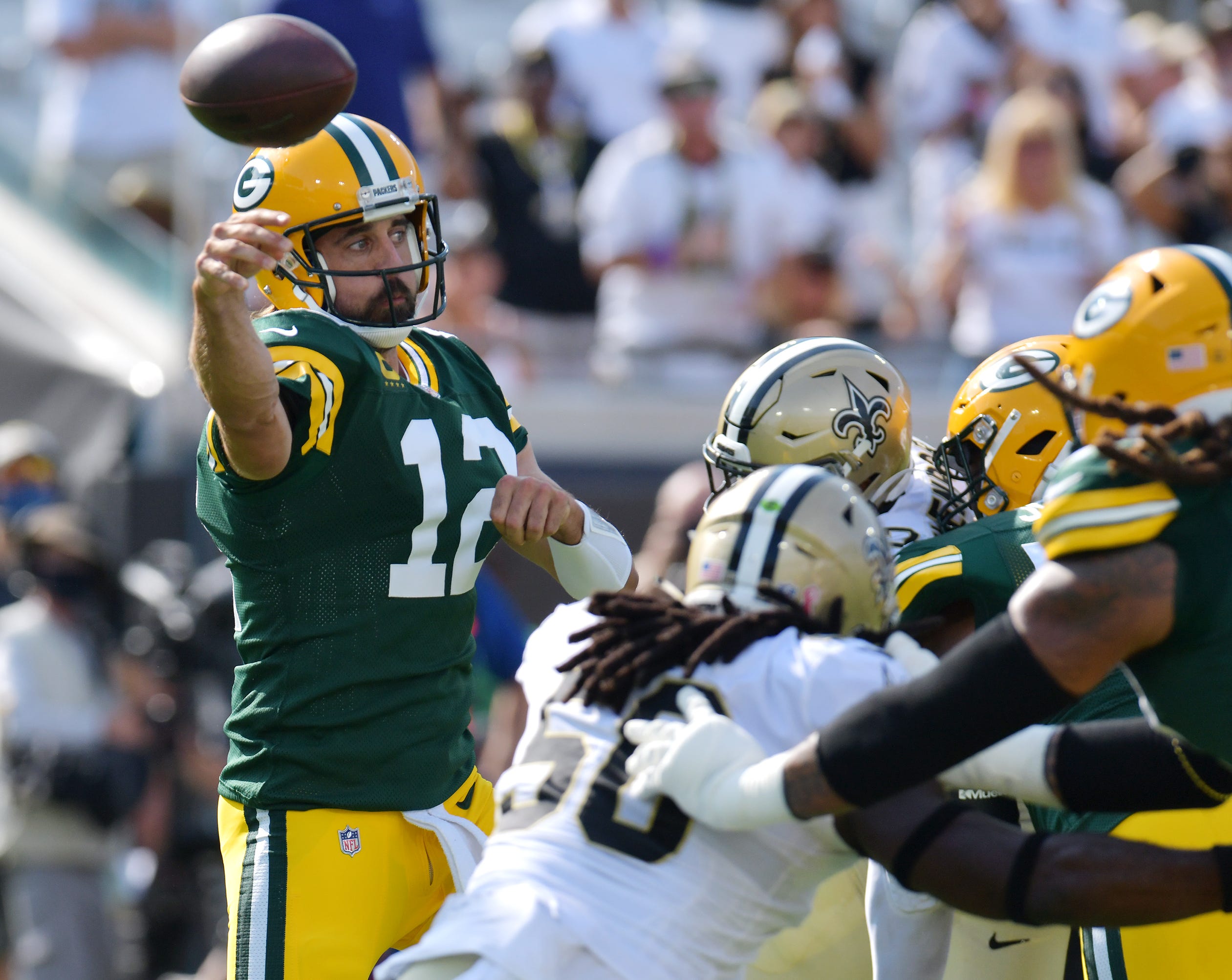 Green Bay Packers quarterback Aaron Rodgers (12) gets off a pass during early first quarter action. The New Orleans Saints hosted the the Green Bay Packers at TIAA Bank Field in Jacksonville, FL Sunday, September 12, 2021 after the Saint's home game had to be move from New Orleans after Hurricane Ida hit the Louisiana coast. The Saints went into the half with a 17 to 3 lead over the Packers. Jki 091221 Saintsvspackers 27