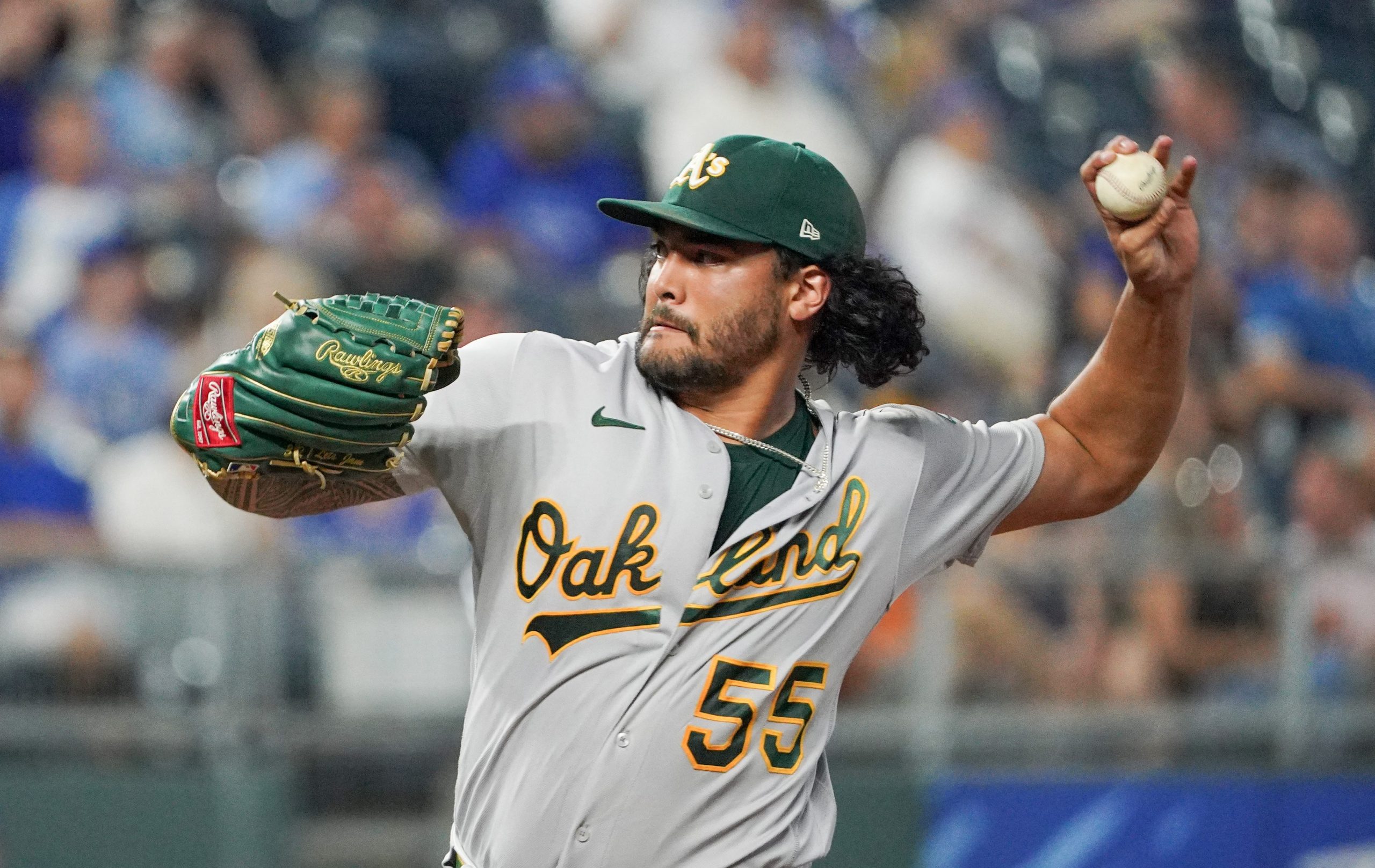 Oakland Athletics starting pitcher Sean Manaea (55) delivers against the Kansas City Royals in the third inning at Kauffman Stadium. Mandatory Credit: Denny Medley-USA TODAY Sports