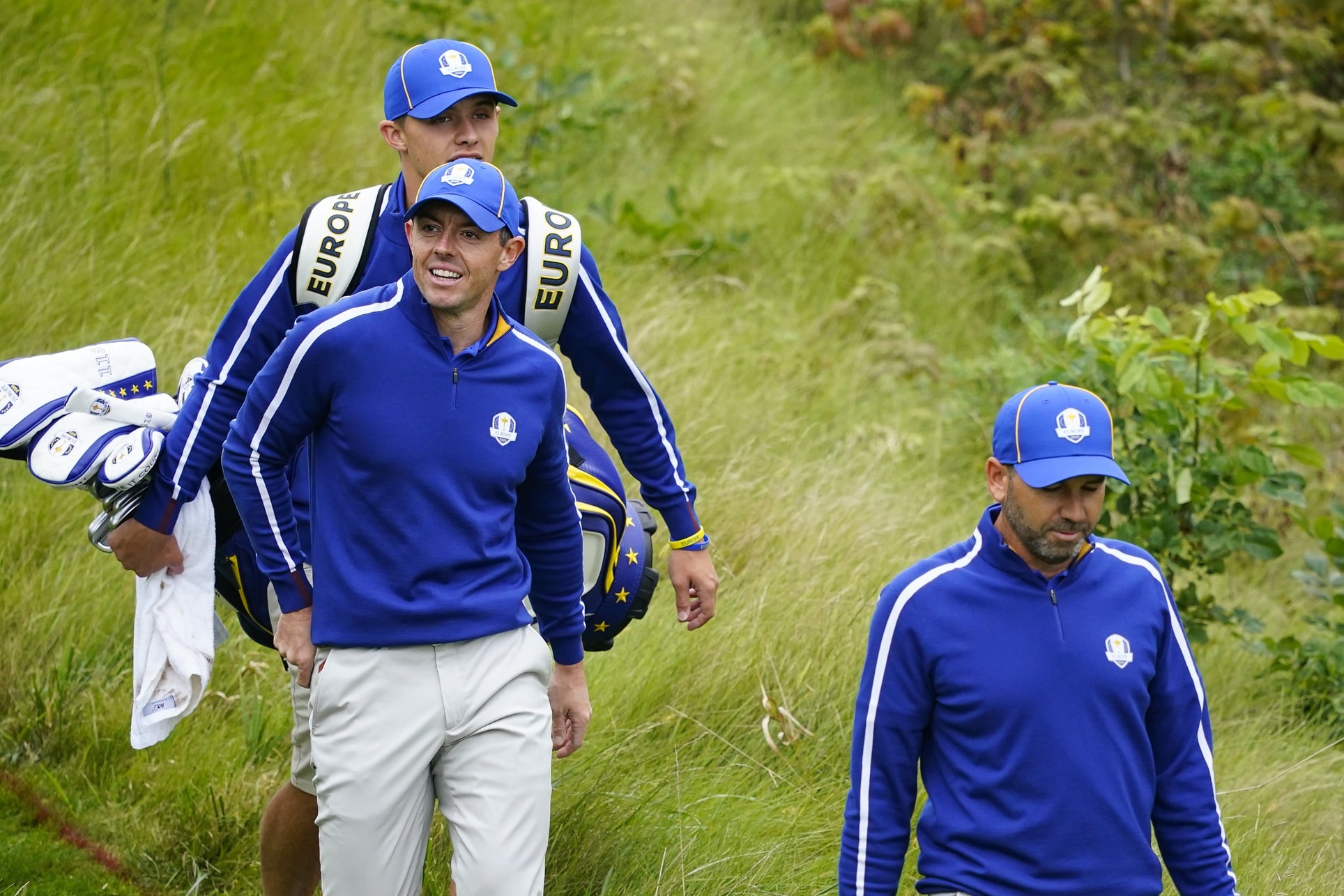 Rory McIlroy (left) and Sergio Garcia walk to the 10th fairway during practice rounds for the 43rd Ryder Cup golf competition at Whistling Straits.