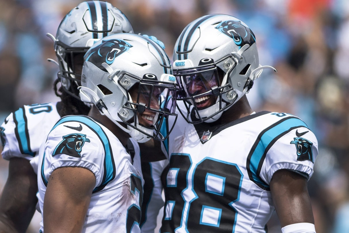 Carolina Panthers wide receiver D.J. Moore (2) reacts with wide receiver Terrace Marshall Jr. (88) after scoring a touchdown in the second quarter at Bank of America Stadium.
