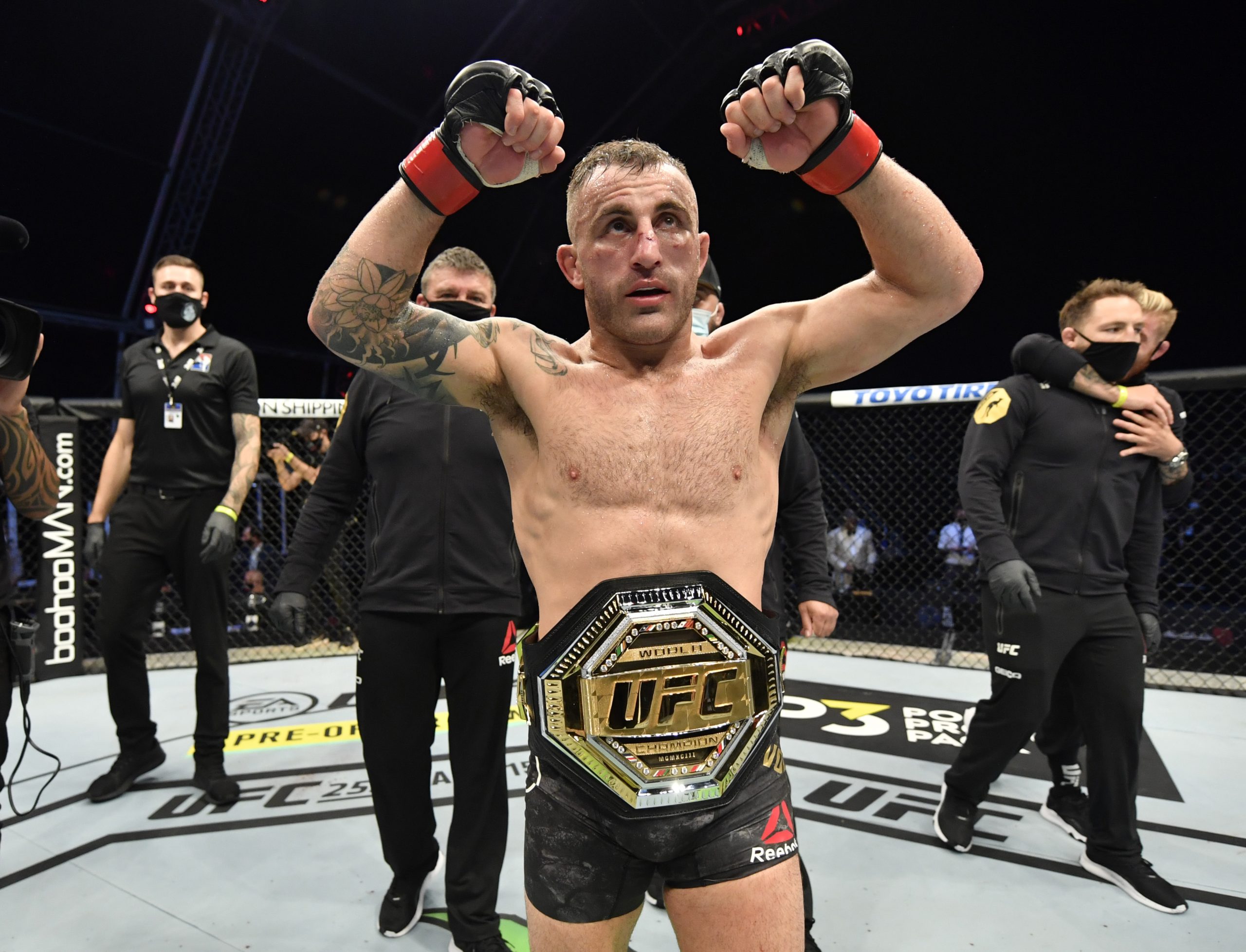 July 12, 2020; Abu Dhabi, UAE; Alexander Volkanovski of Australia celebrates after his split-decision victory over Max Holloway in their UFC featherweight championship fight during the UFC 251 event at Flash Forum on UFC Fight Island on July 12, 2020 on Yas Island, Abu Dhabi, United Arab Emirates.