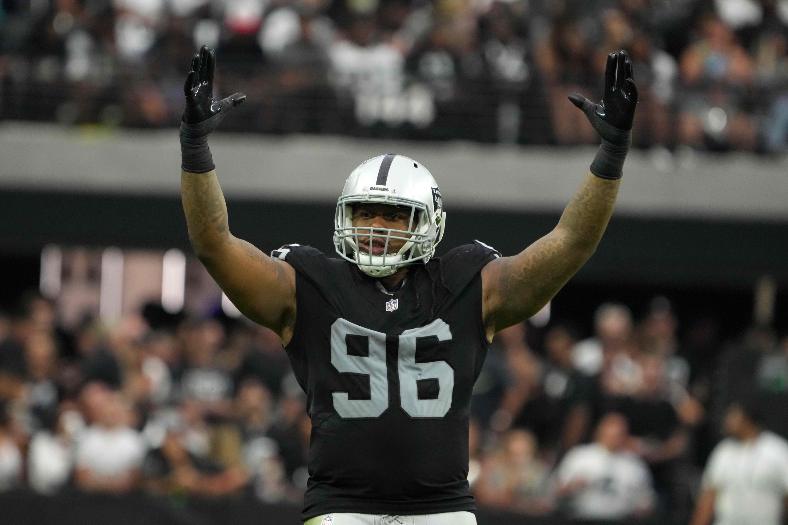 Las Vegas Raiders defensive tackle Darius Philon (96) celebrates in the second half against the Miami Dolphinsat Allegiant Stadium.The Raiders defeated the Dolphins 31-28 in overtime.