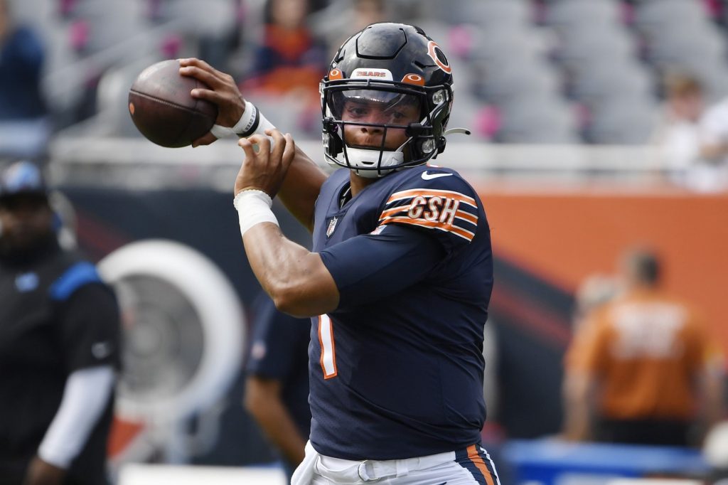 Chicago Bears quarterback Justin Fields (1) warms up before the game against the Detroit Lions at Soldier Field. parlay