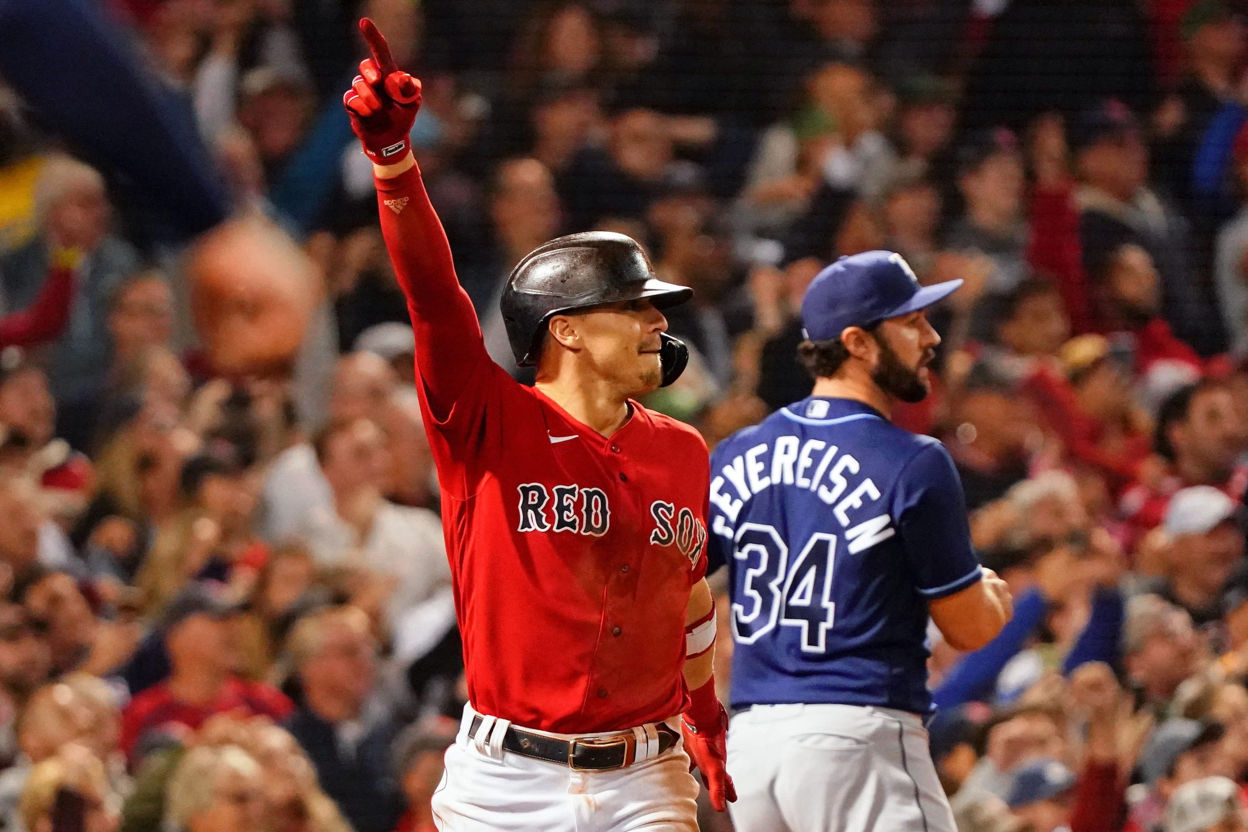 Boston Red Sox center fielder Enrique Hernandez (5) reacts after hitting a walk-off sacrifice fly against the Tampa Bay Rays to score pinch runner Danny Santana (not pictured) during the ninth inning during game four of the 2021 ALDS at Fenway Park. The Boston Red Sox won 6-5. Mandatory Credit: David Butler II-USA TODAY Sports