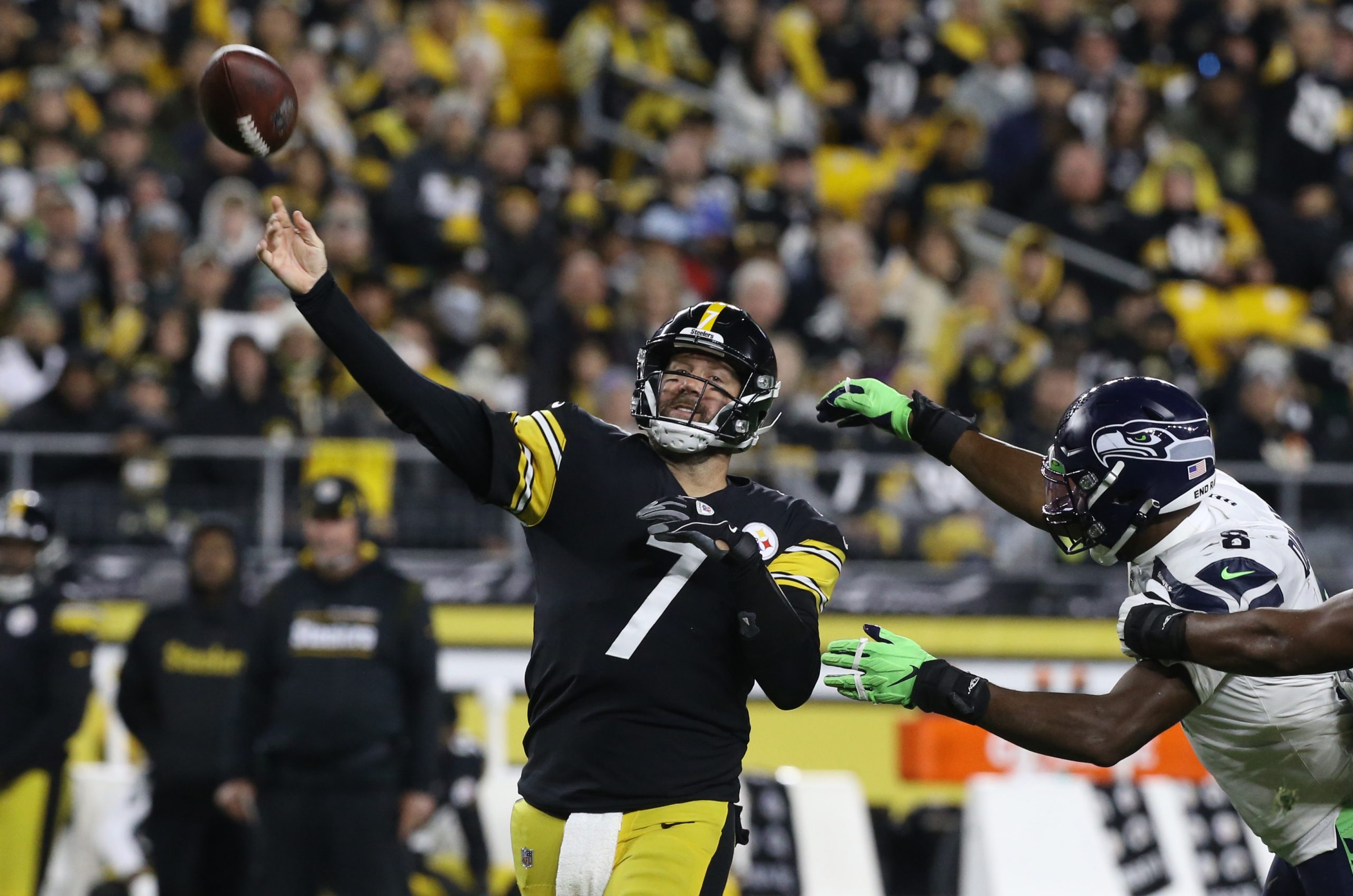Pittsburgh Steelers quarterback Ben Roethlisberger (7) passes the ball as Seattle Seahawks defensive end Carlos Dunlap (8) pressures during the second quarter at Heinz Field