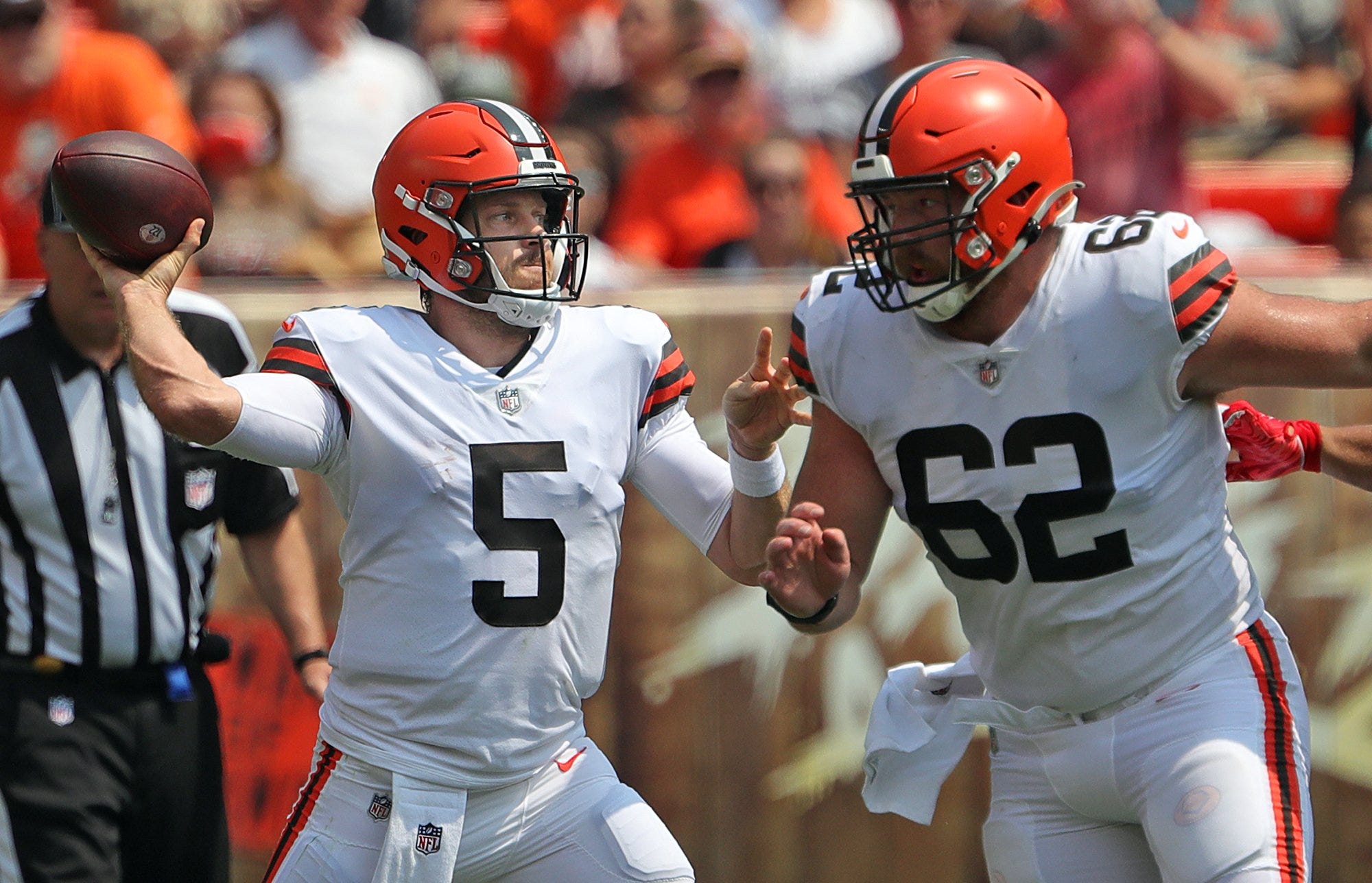 Cleveland Browns quarterback Case Keenum (5) looks to pass during the first half of an NFL preseason football game against the New York Giants, Sunday, Aug. 22, 2021, in Cleveland, Ohio