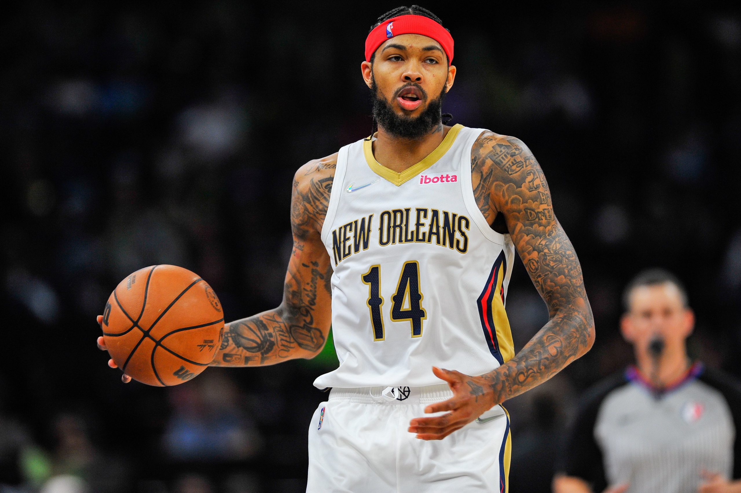 Pelicans forward Brandon Ingram (14) controls the ball during the fourth quarter against the Minnesota Timberwolves at Target Center.