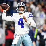 Dallas Cowboys quarterback Dak Prescott (4) passes the ball against the New England Patriots during the second half at Gillette Stadium.