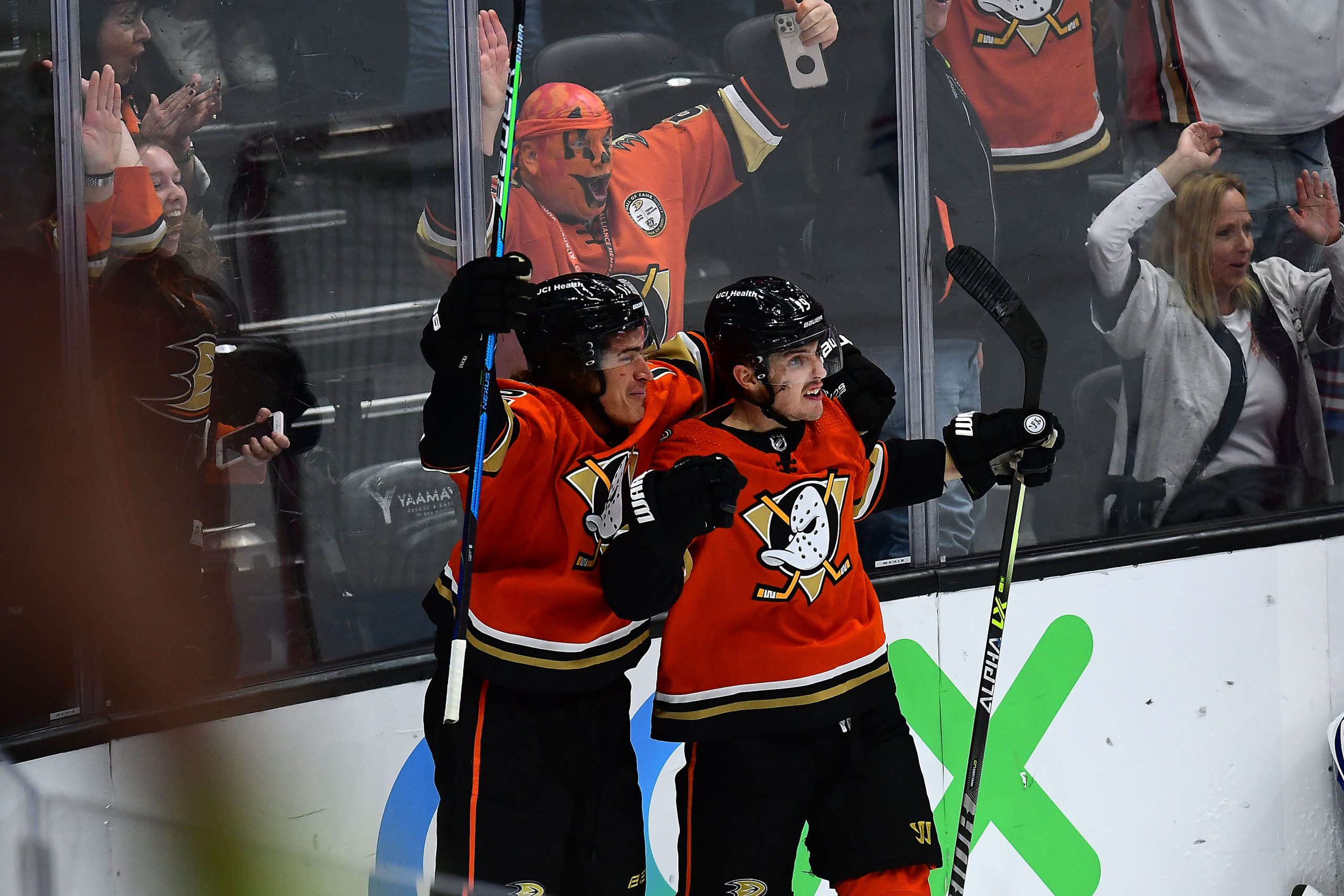 Anaheim Ducks center Troy Terry (19) celebrates with left wing Sonny Milano (12) his goal scored against the Montreal Canadiens during the third period at Honda Center. Mandatory Credit: Gary A. Vasquez-USA TODAY Sports