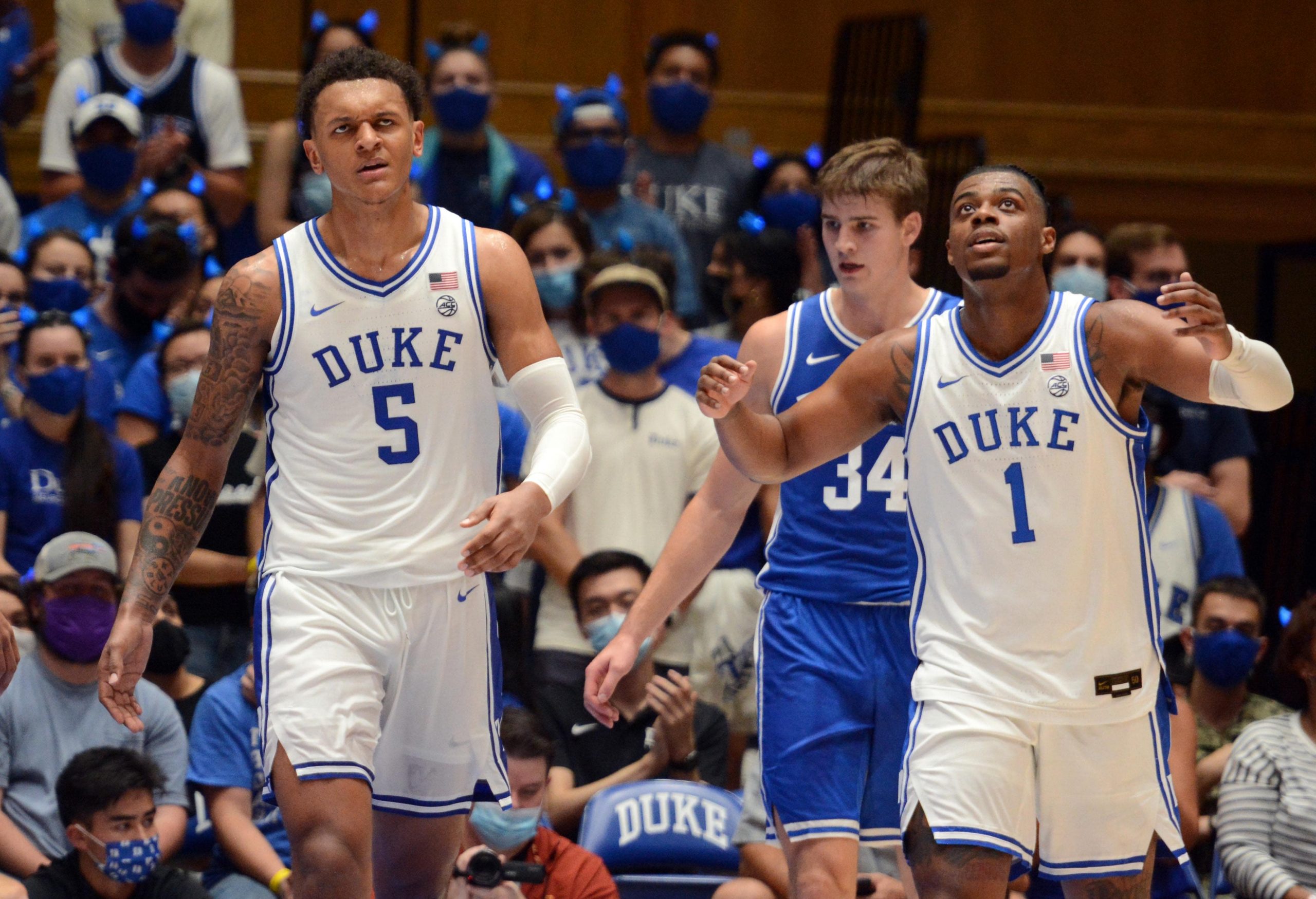 Duke Blue Devils forward Paolo Banchero (5) reacts after dunking as guard Trevor Keels (1) watches the replay during Duke Countdown to Craziness at Cameron Indoor Stadium